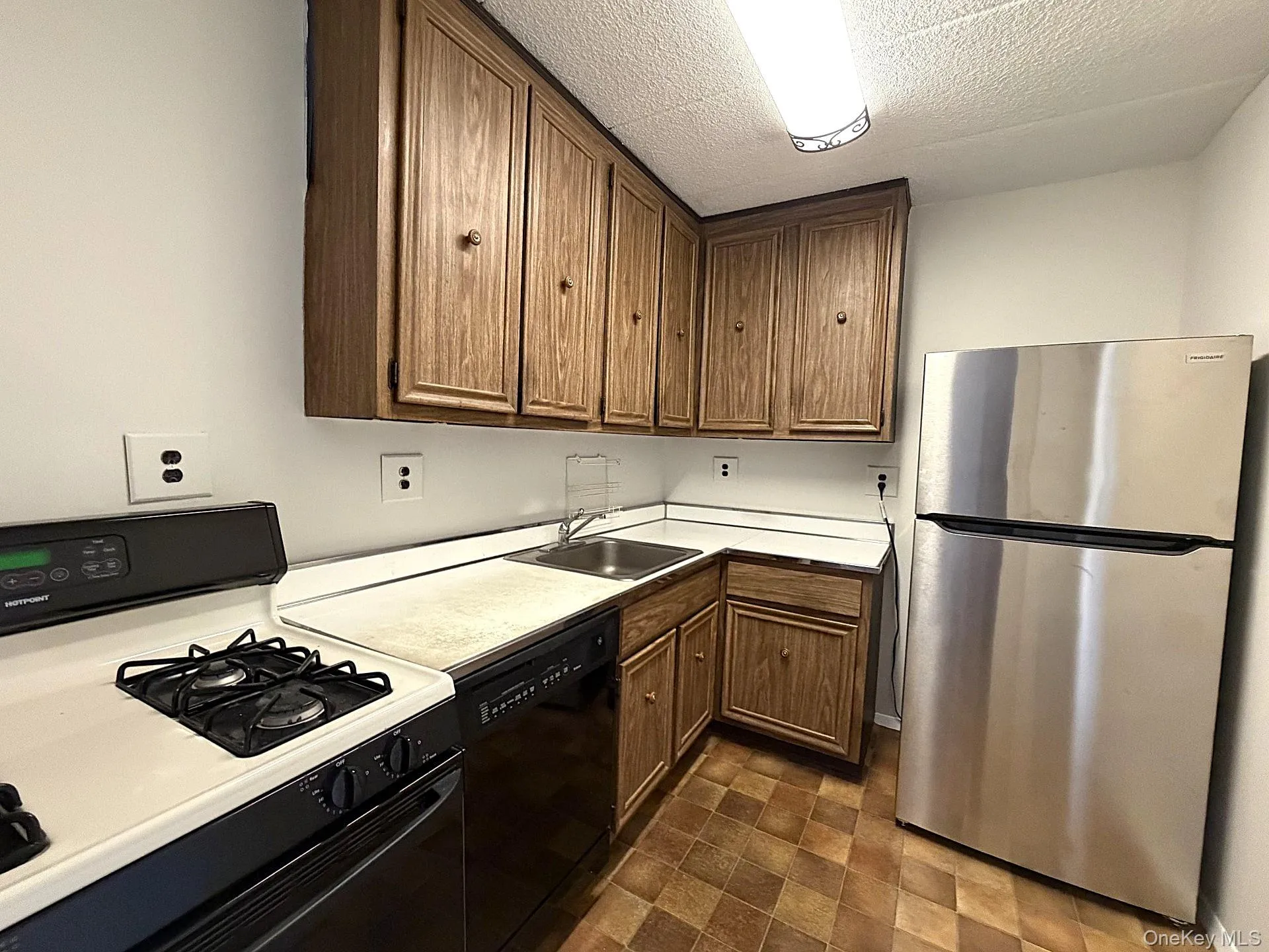 Kitchen with brand new fridge Kitchen with brand new fridge