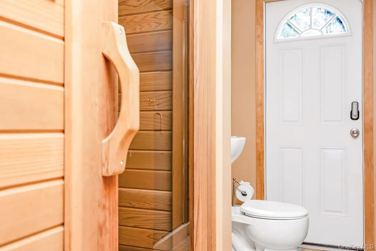 Walkout level bathroom features a Sauna and access to yard Walkout level bathroom features a Sauna and access to yard