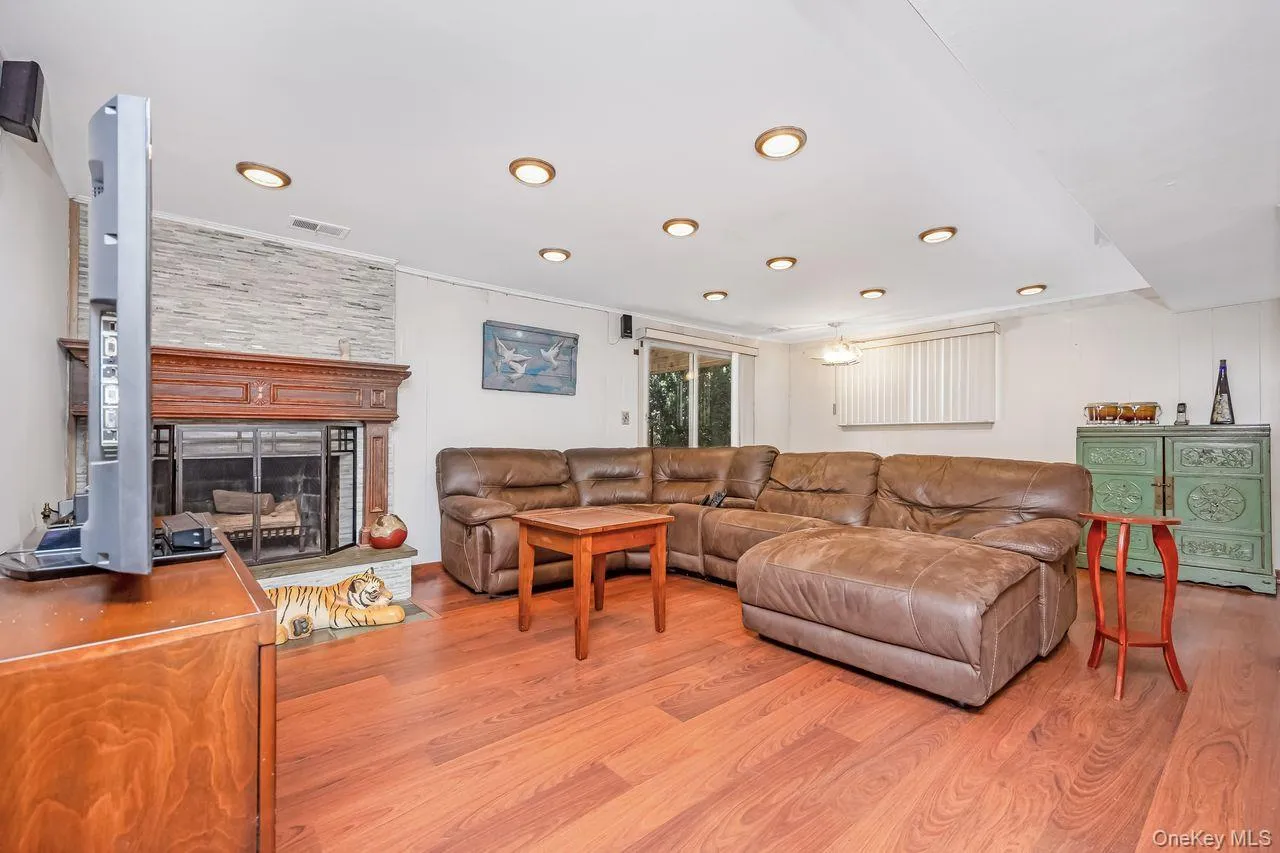 Family room with fireplace on walkout level to yard Family room with fireplace on walkout level to yard
