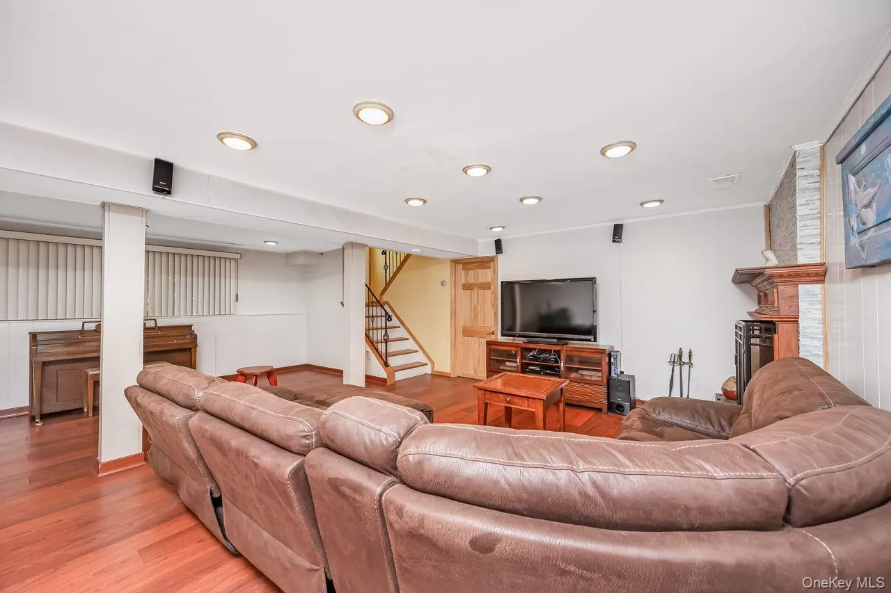 Family room with fireplace on walkout level to yard Family room with fireplace on walkout level to yard