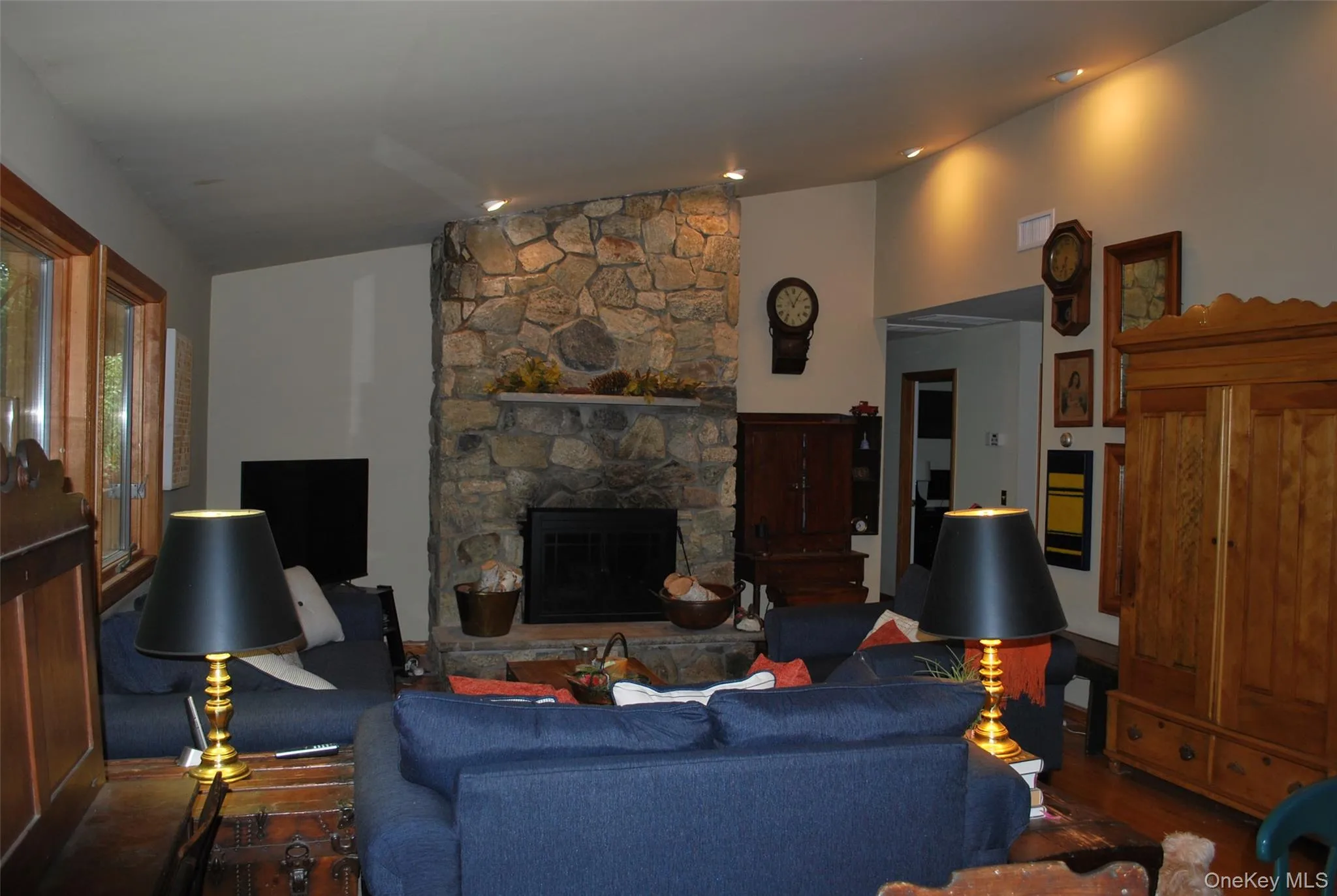 Vaulted ceiling and stone fireplace Vaulted ceiling and stone fireplace