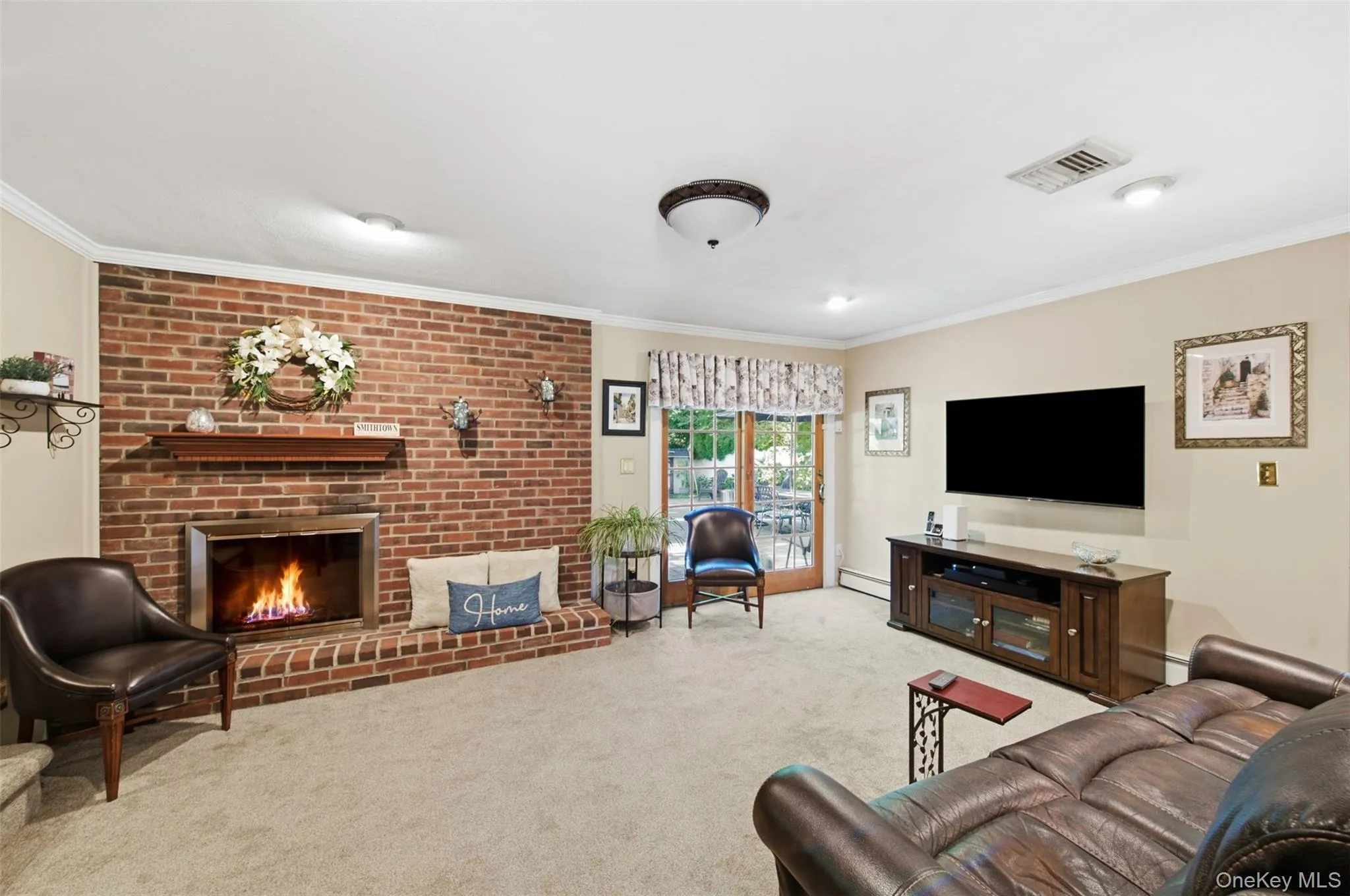 Brick fireplace with a wood mantle and hearth Brick fireplace with a wood mantle and hearth