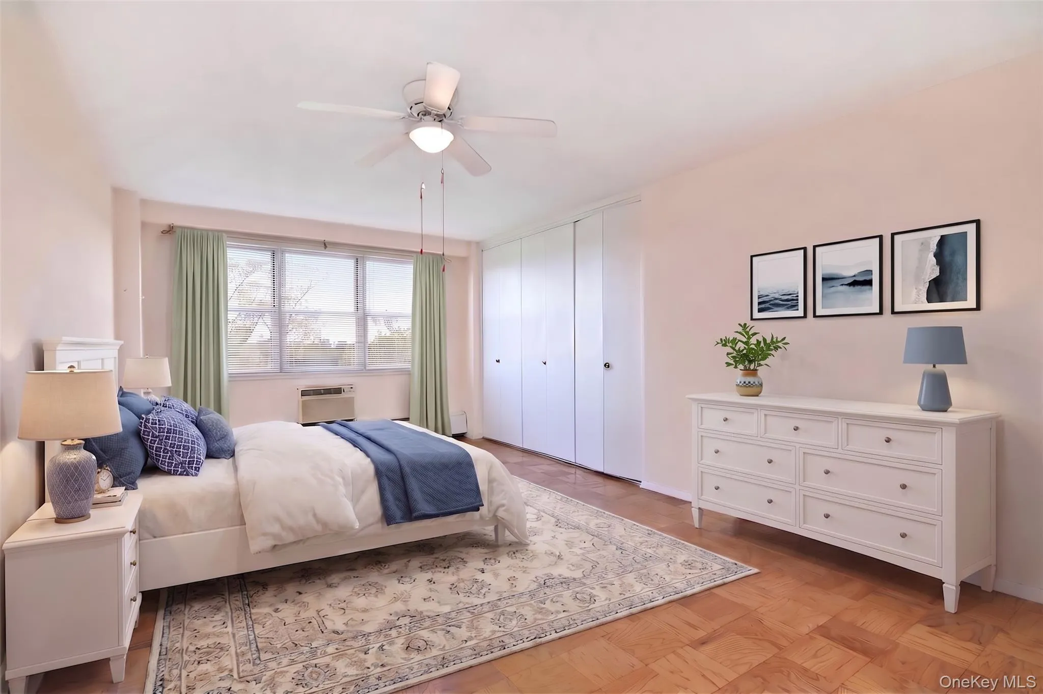 Virtually staged Large bedroom with ample closet space Virtually staged Large bedroom with ample closet space