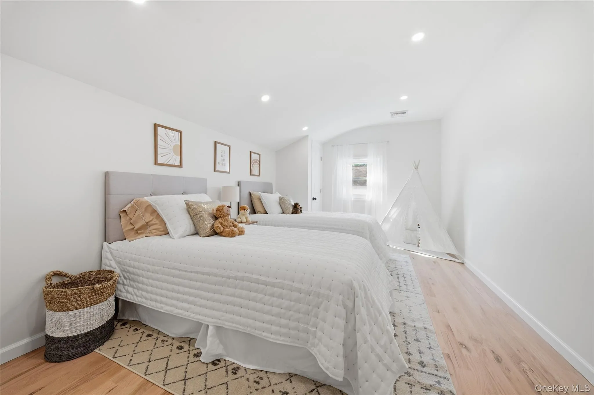 Bedroom,Recessed ceiling lighting, light wood-finish flooring, white painted walls, and a window with sheer curtains Bedroom,Recessed ceiling lighting, light wood-finish flooring, white painted walls, and a window with sheer curtains