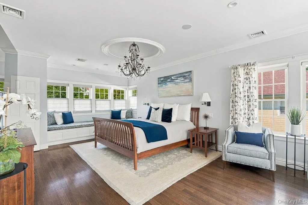 Lofty ceiling and built-in window seat with exceptional millwork Lofty ceiling and built-in window seat with exceptional millwork
