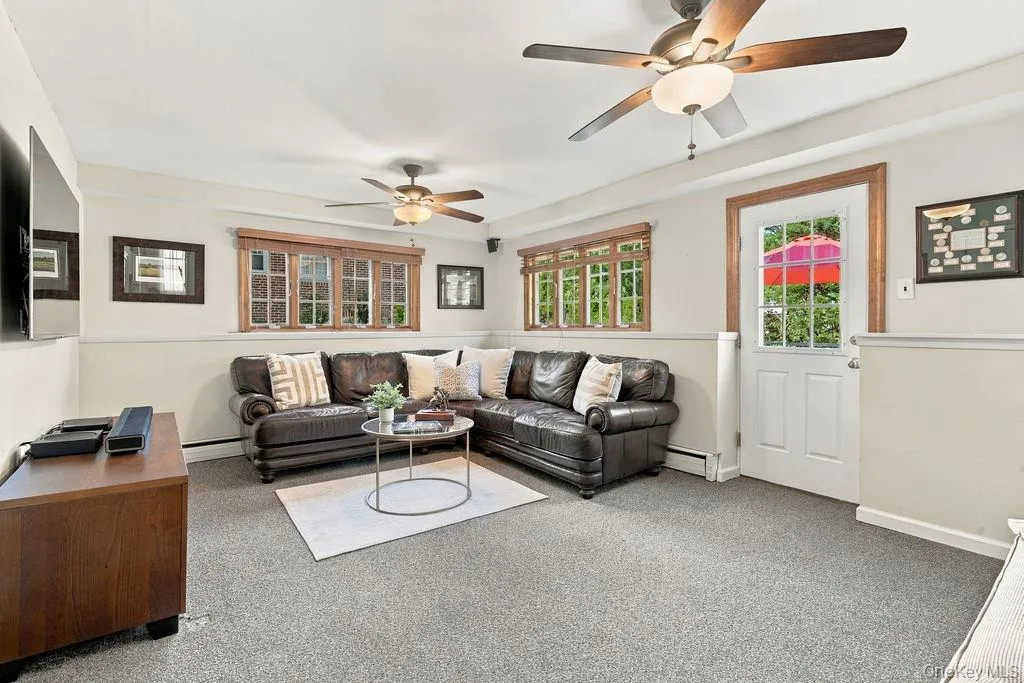 Large relaxing family room opens out to elegant patio Large relaxing family room opens out to elegant patio