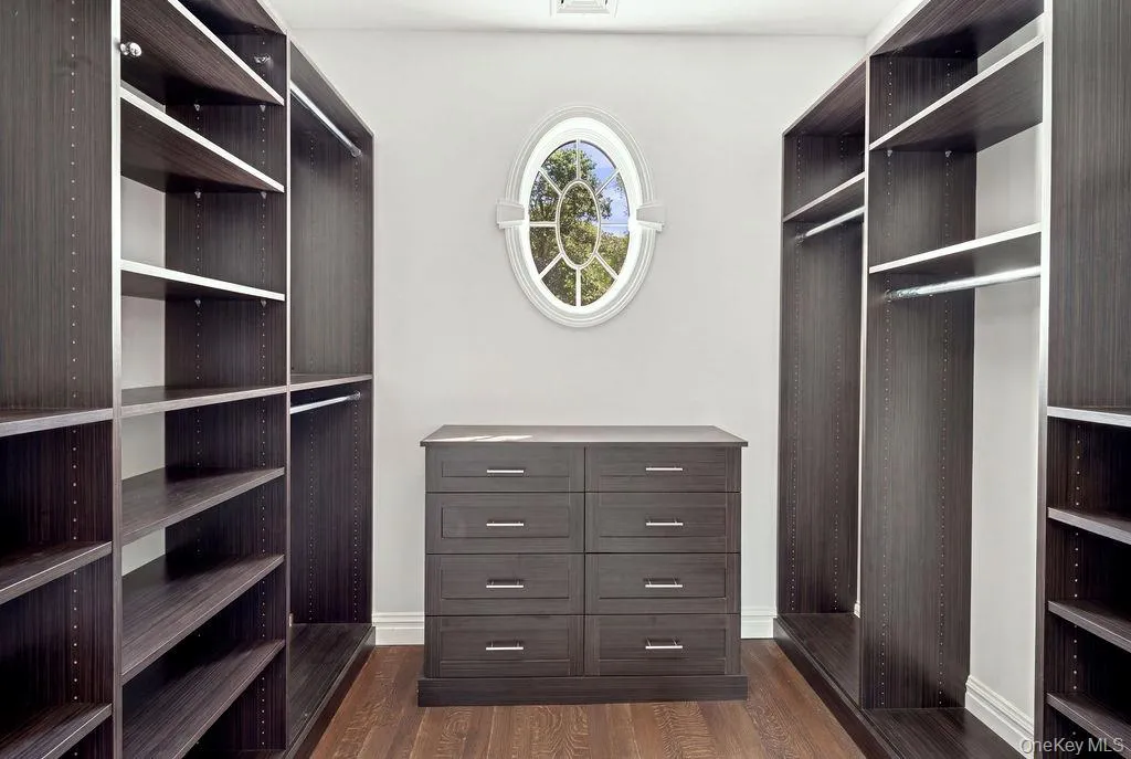2 custom designed walk-in closets 2 custom designed walk-in closets