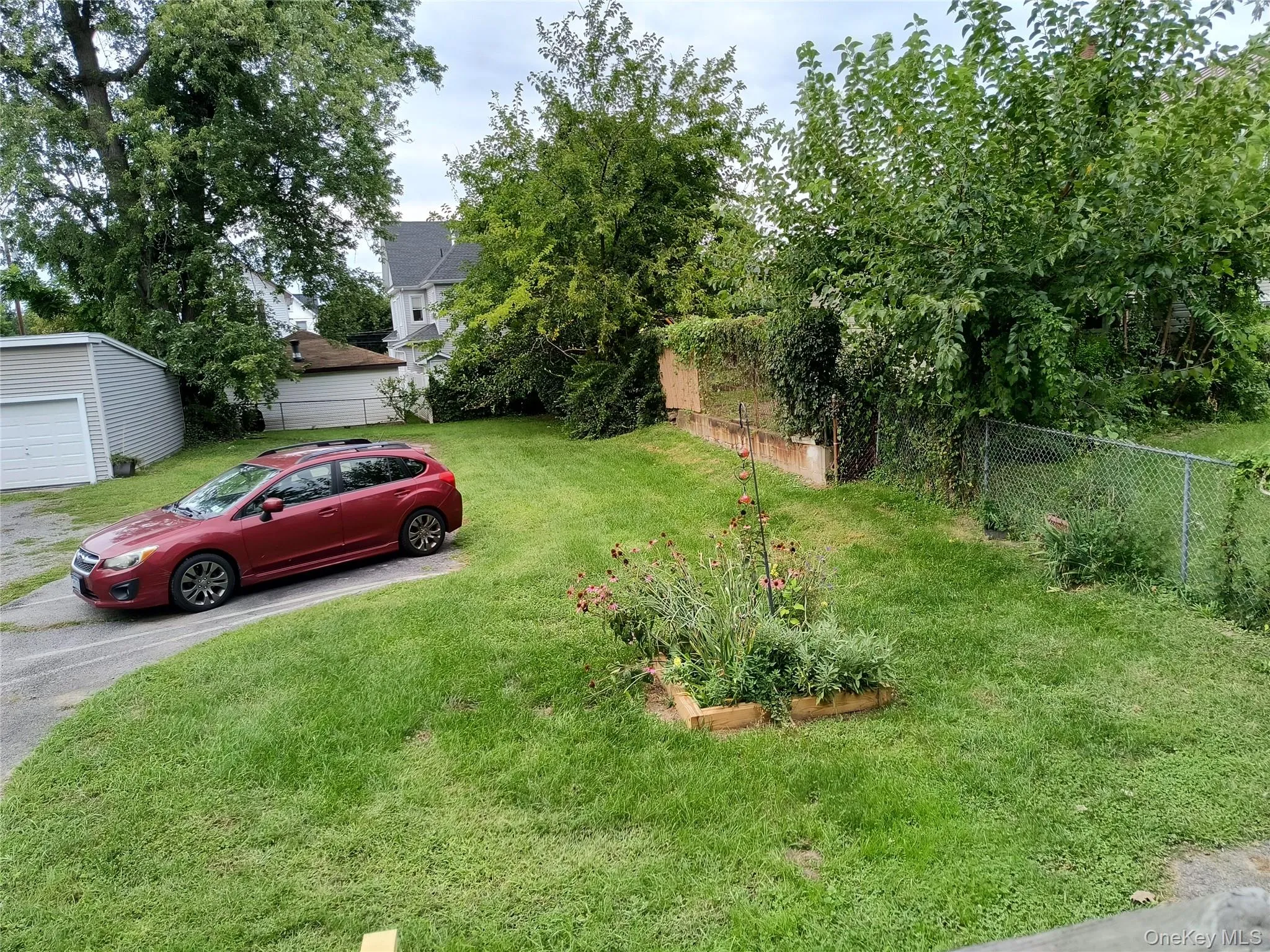 Rear yard & 2 parking spaces for #37 Cross St. Rear yard & 2 parking spaces for #37 Cross St.