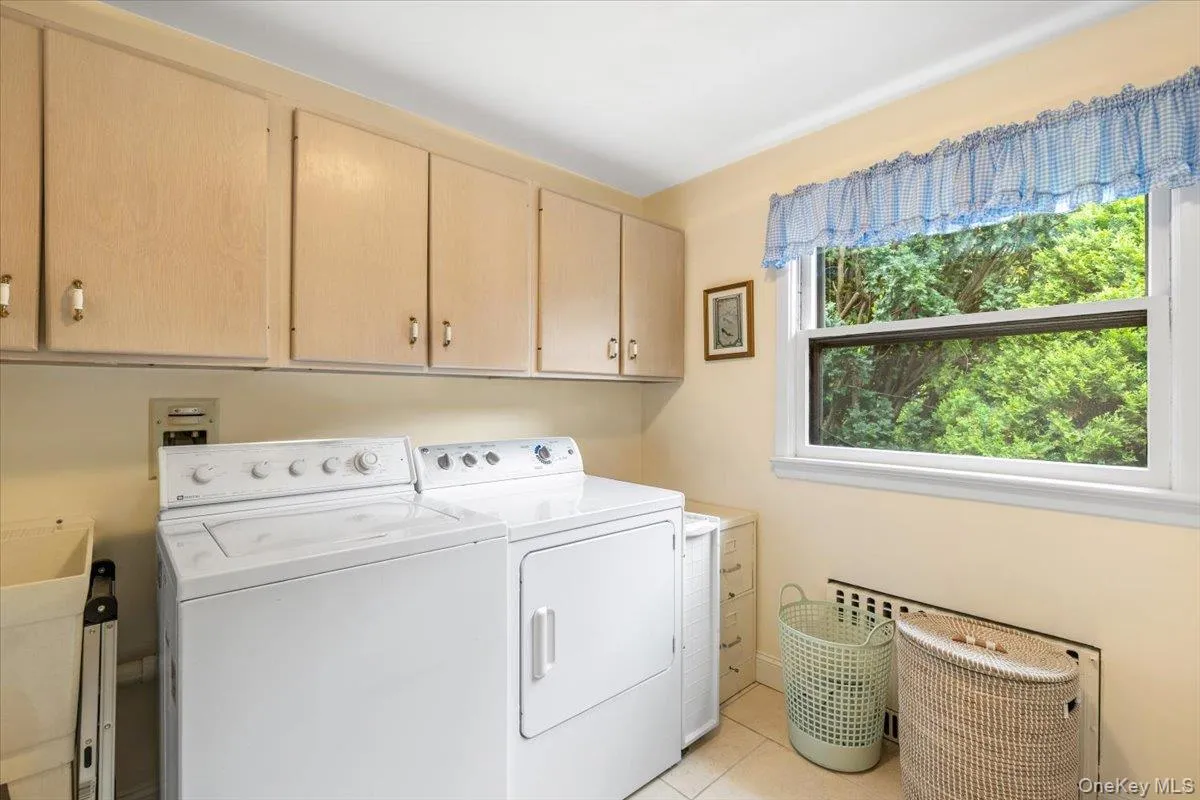 First floor laundry room. First floor laundry room.