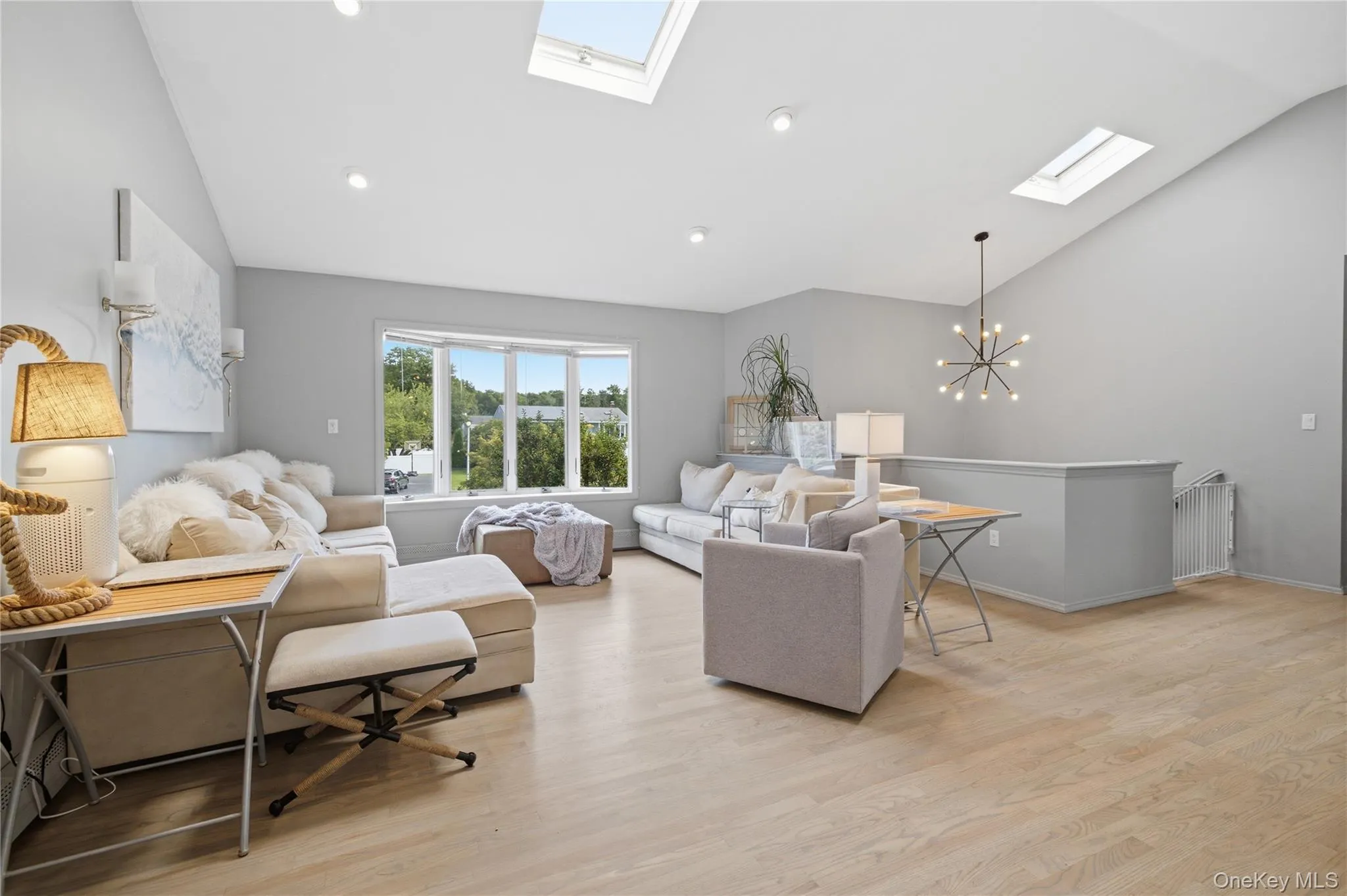 Upper level living room with skylights Upper level living room with skylights