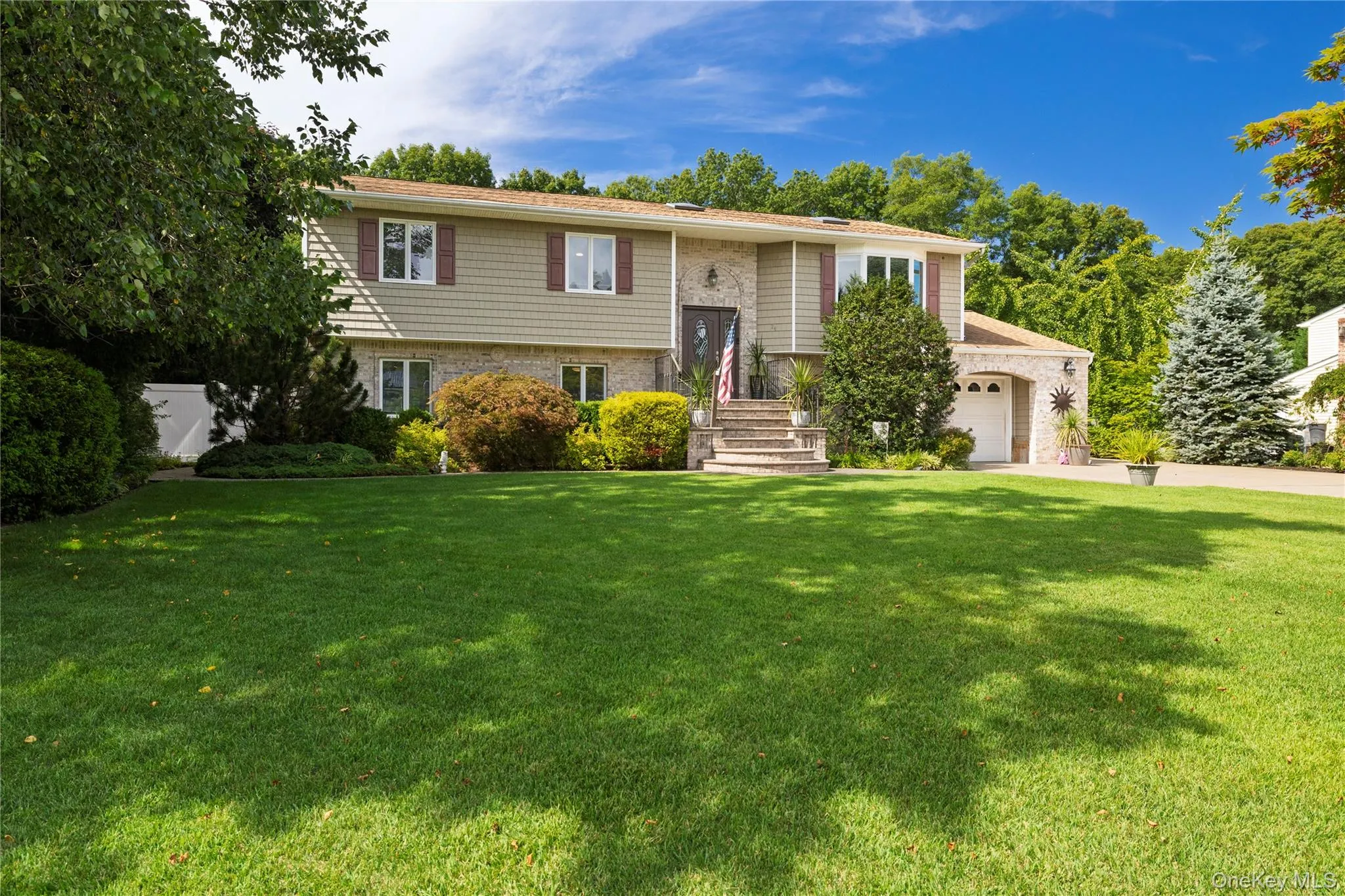 Professionally landscaped property featuring specifically selected trees for localized environment. Professionally landscaped property featuring specifically selected trees for localized environment.