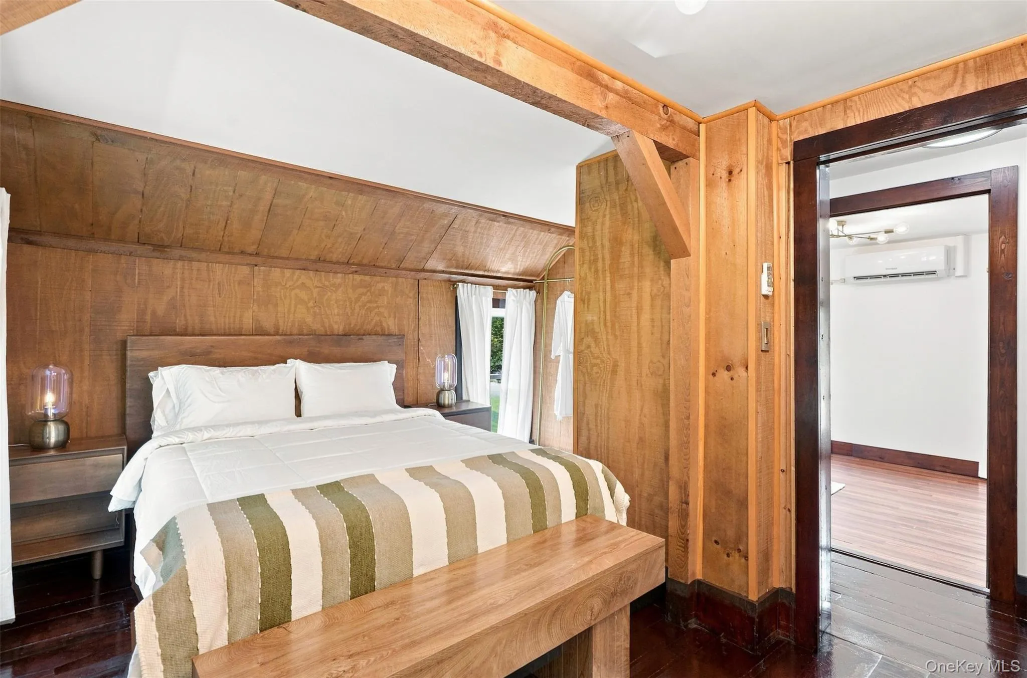 Hardwood floors, exposed wood, new mini split systems and beautiful lighting Hardwood floors, exposed wood, new mini split systems and beautiful lighting