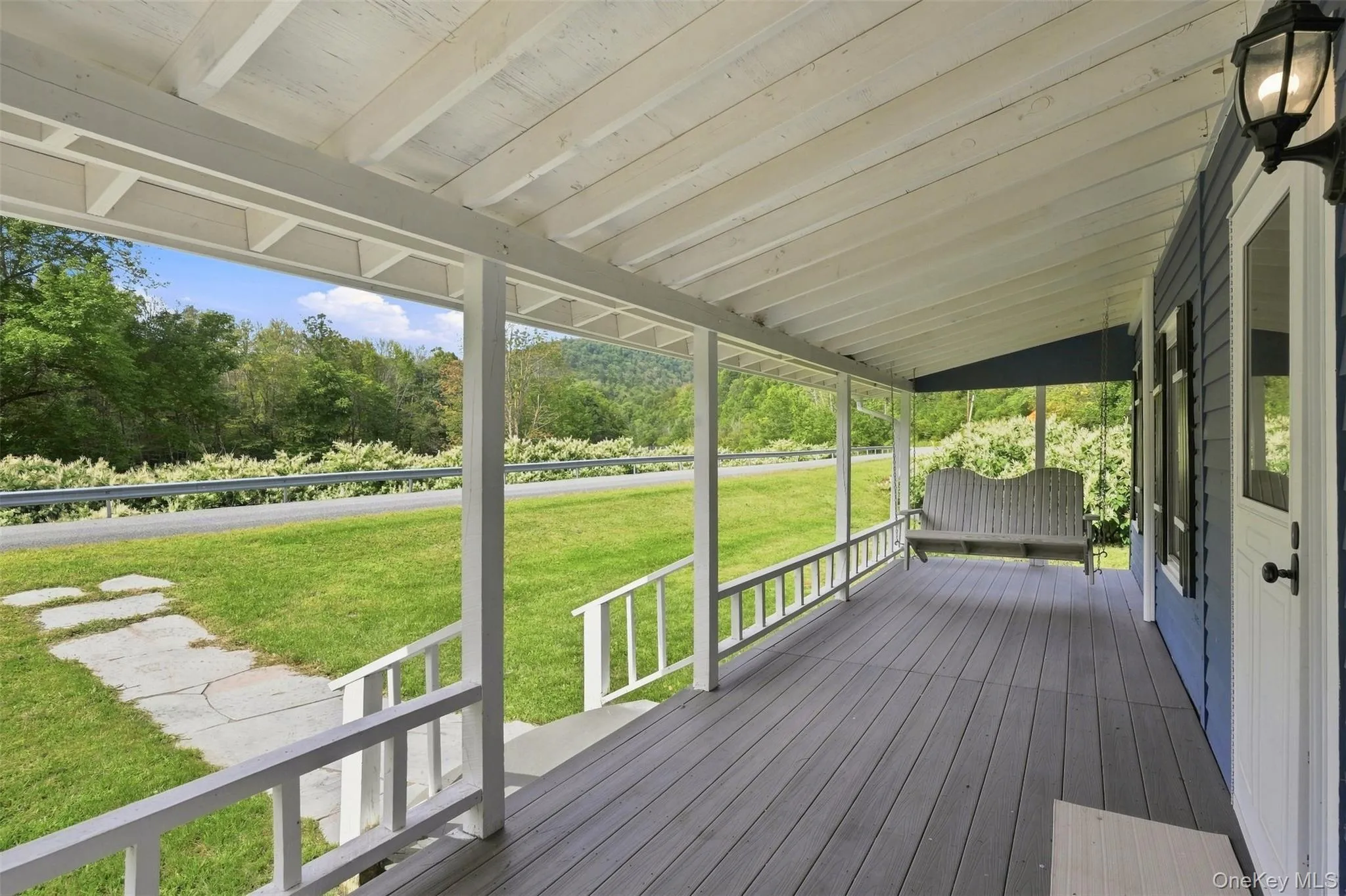 The quintessential porch swing. A must for country living. The quintessential porch swing. A must for country living.