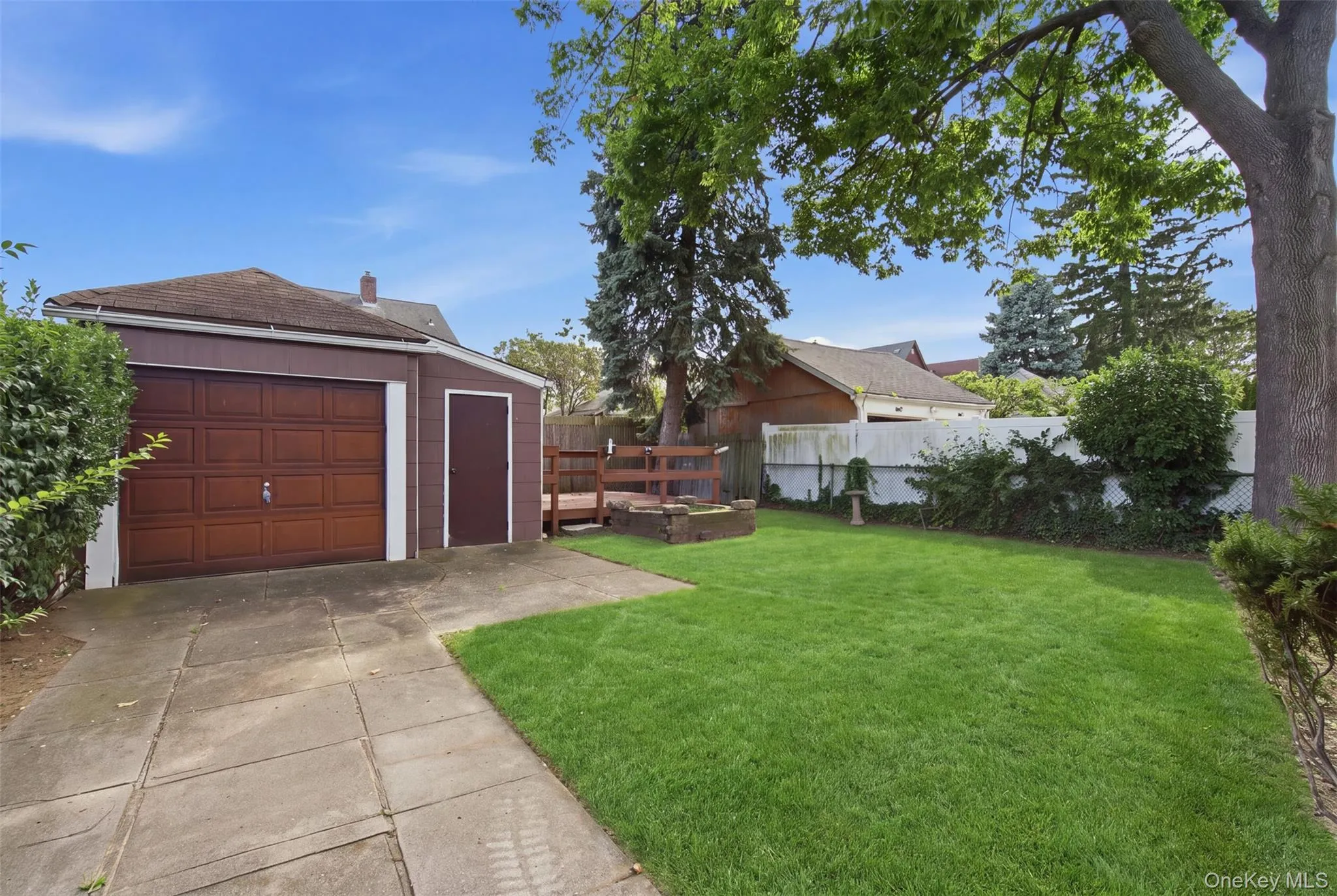 One Car Garage w/ Storage Shed One Car Garage w/ Storage Shed