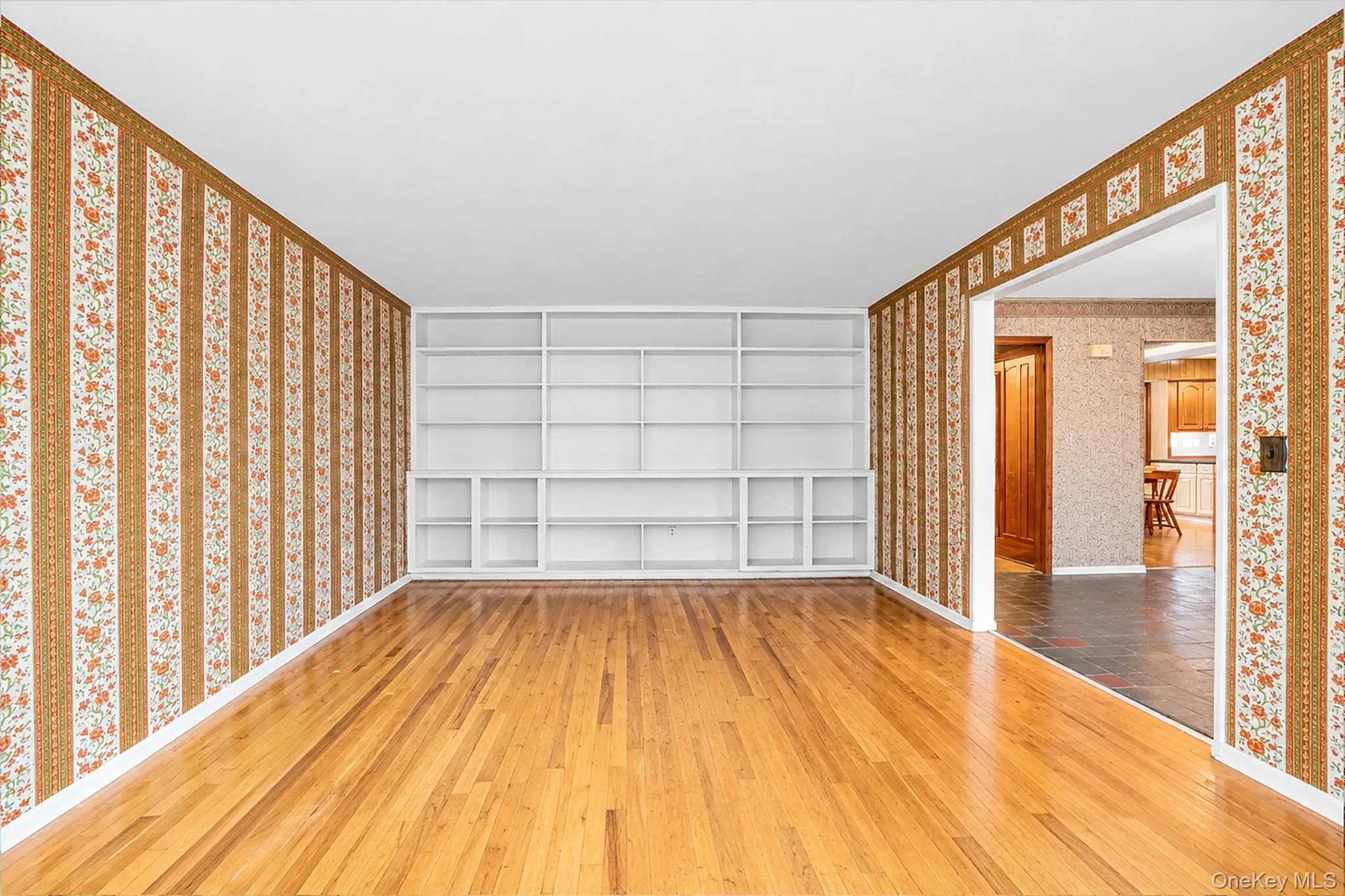 with hardwood floors and bookcases with hardwood floors and bookcases