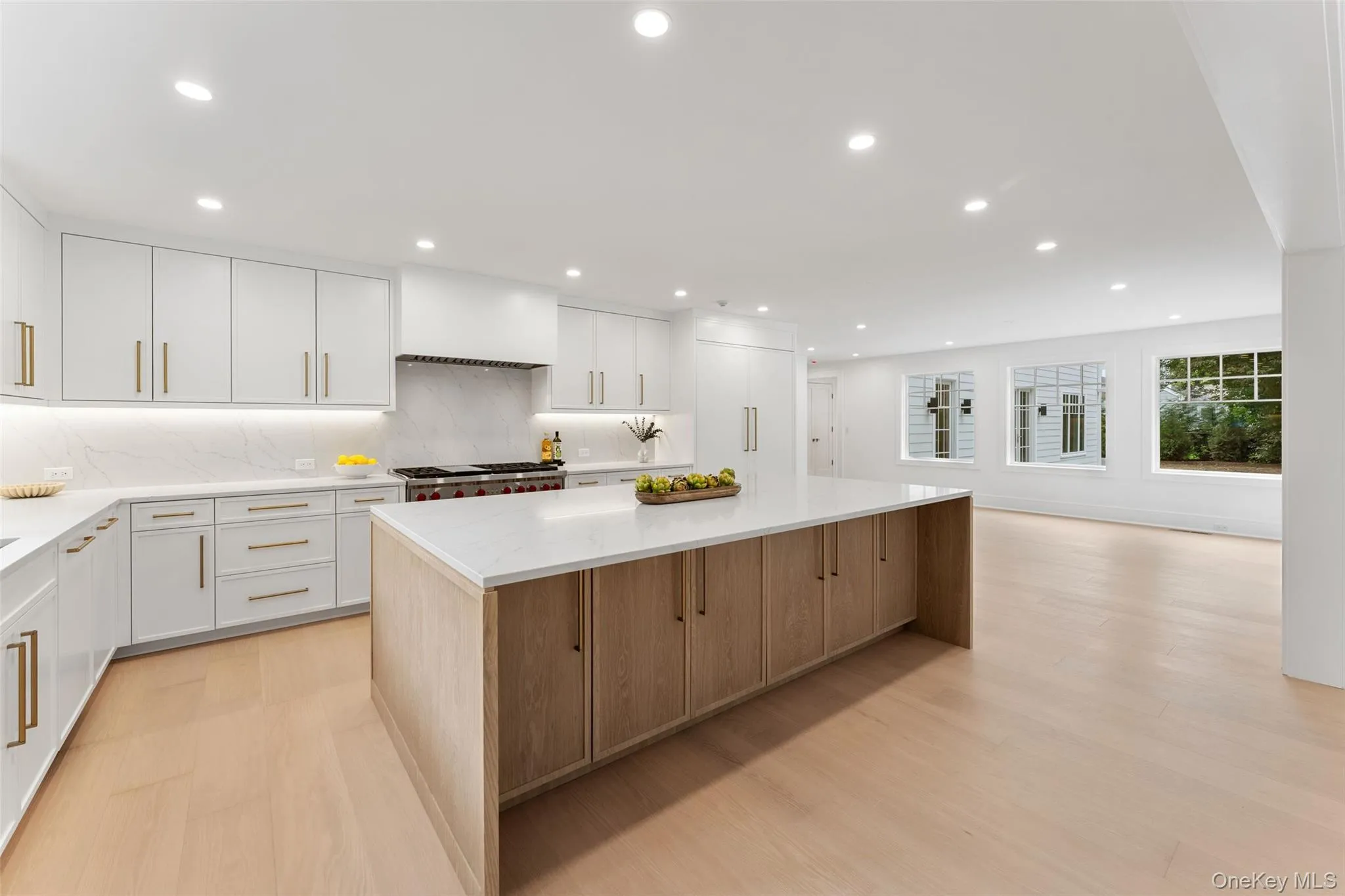 Kitchen with custom cabinetry and huige center island Kitchen with custom cabinetry and huige center island