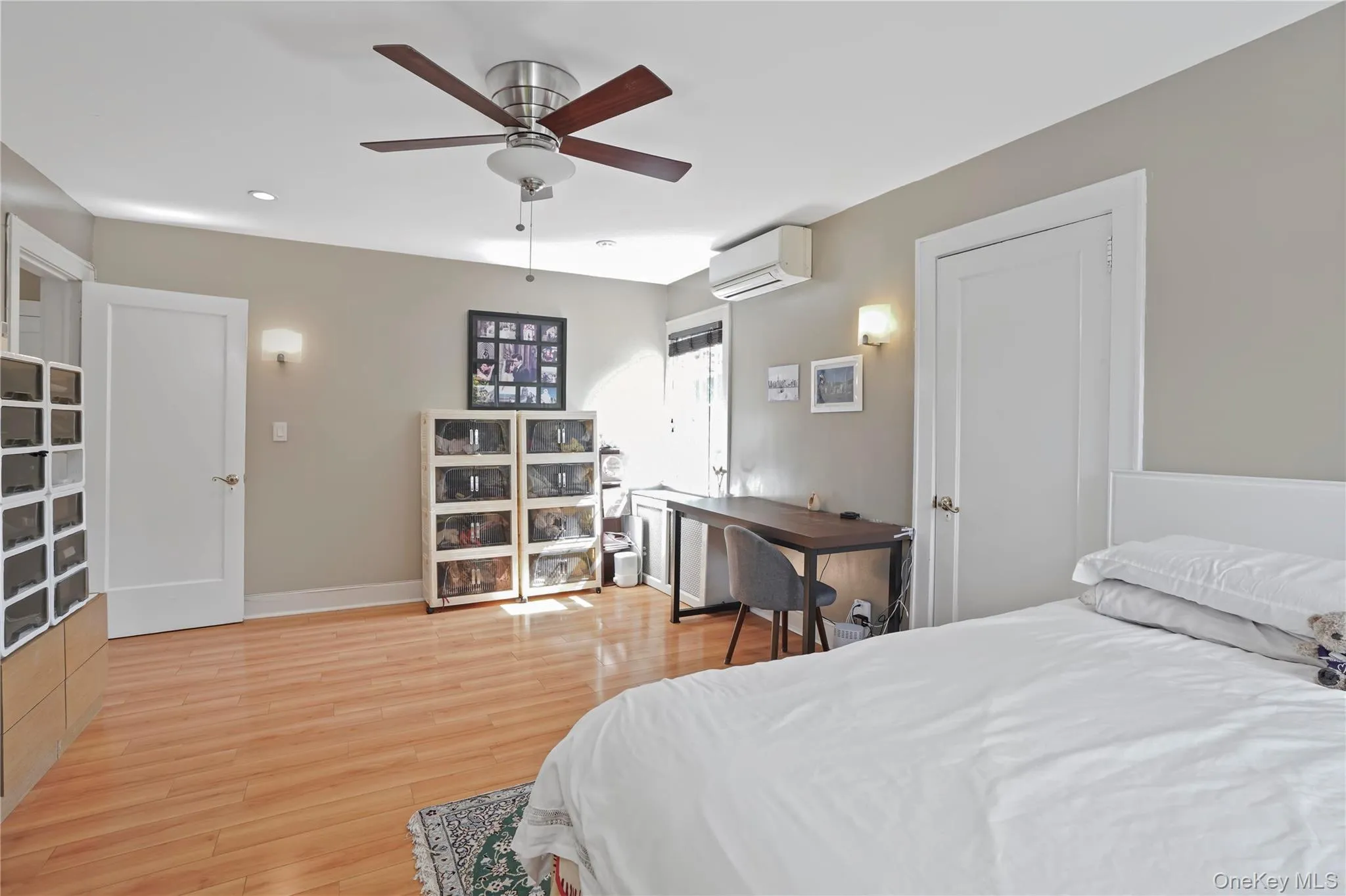 Primary Bedroom With Ceiling Fan & Two Closets Primary Bedroom With Ceiling Fan & Two Closets