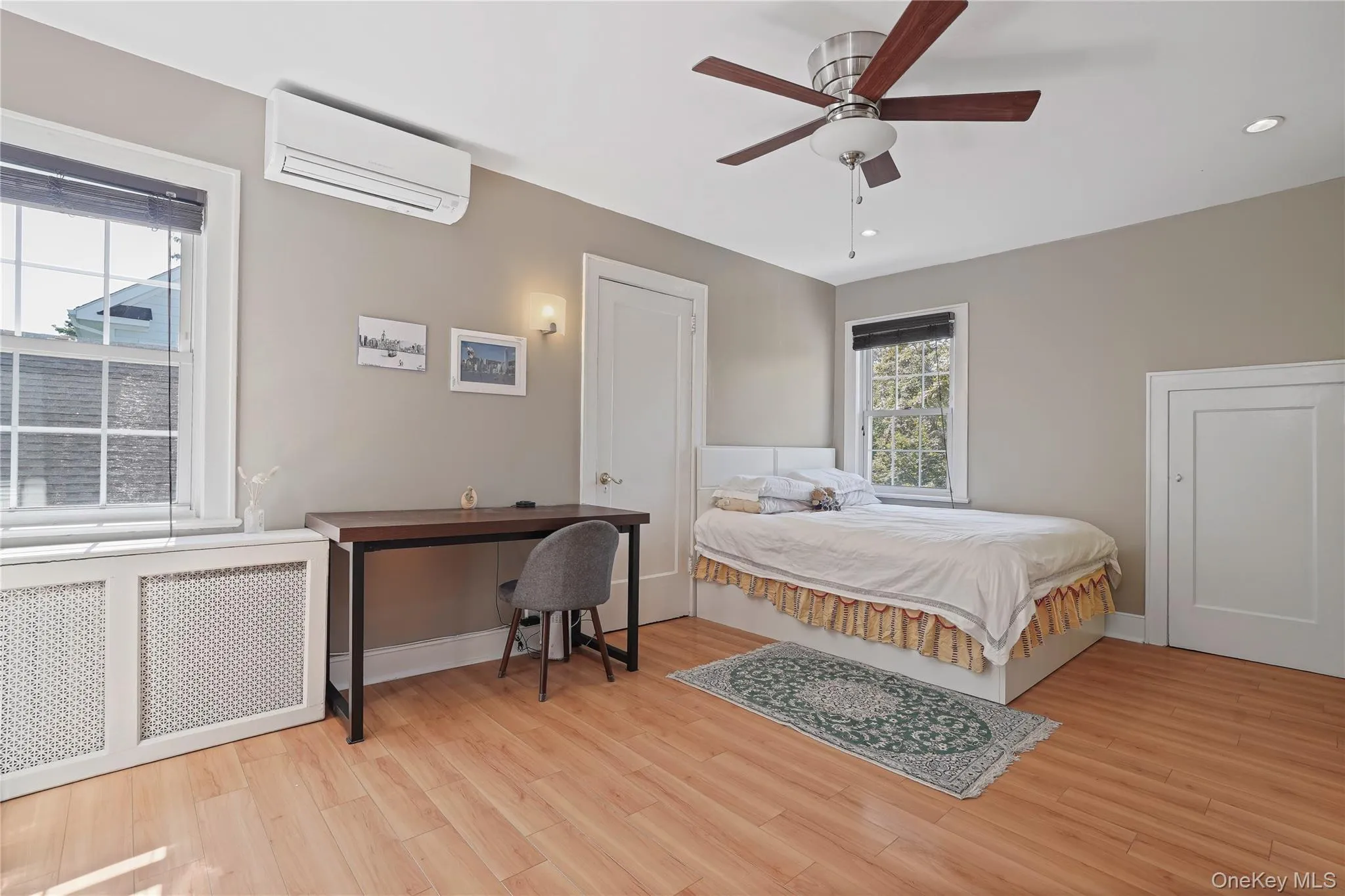 Primary Bedroom With Ceiling Fan & Two Closets Primary Bedroom With Ceiling Fan & Two Closets
