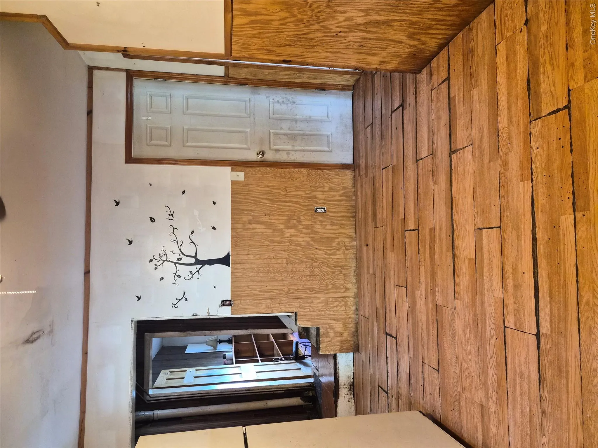 Opposite view of eat-in kitchen looking toward closet and staircase Opposite view of eat-in kitchen looking toward closet and staircase