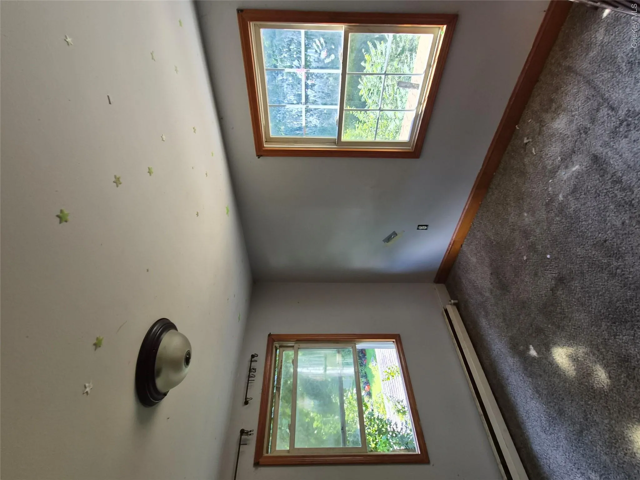 Bedroom 3 with two windows and wall to wall carpet. Bedroom 3 with two windows and wall to wall carpet.