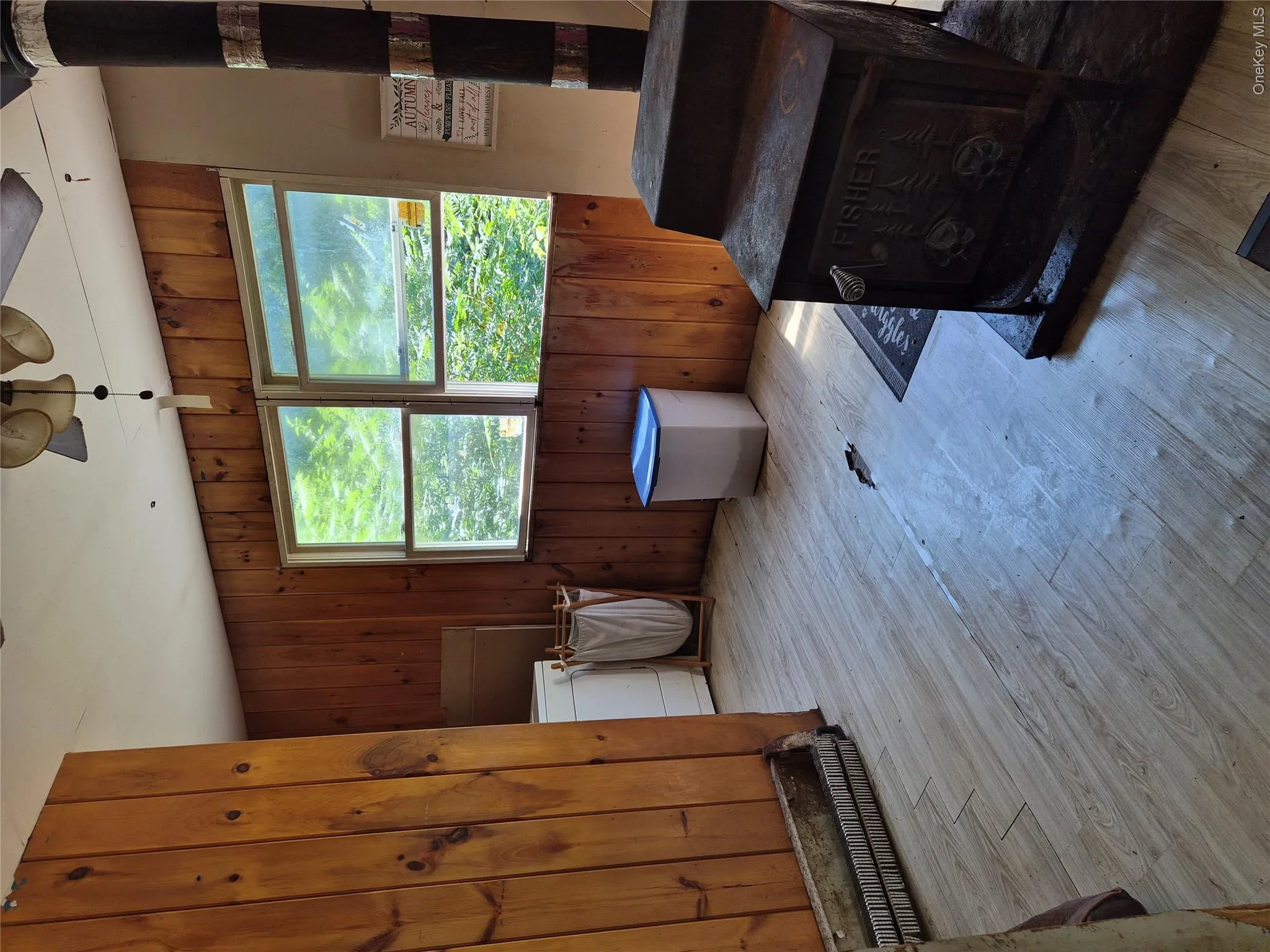 Laundry area with wood burning stove Laundry area with wood burning stove
