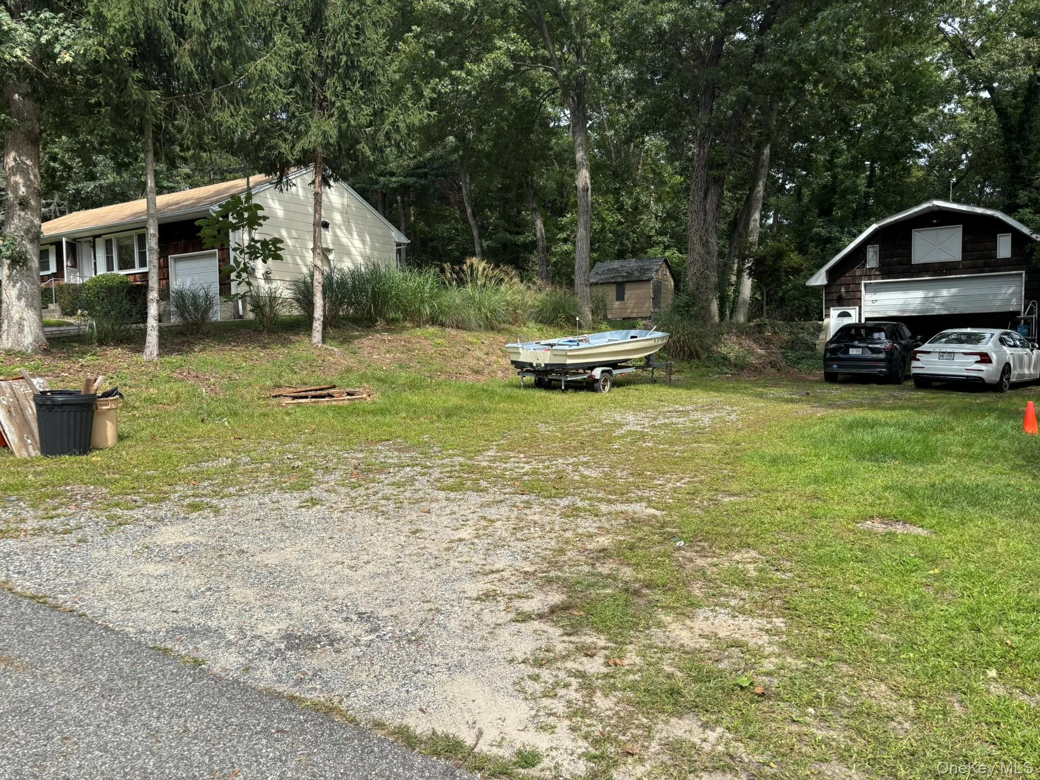 Side yard with barn. Side yard with barn.