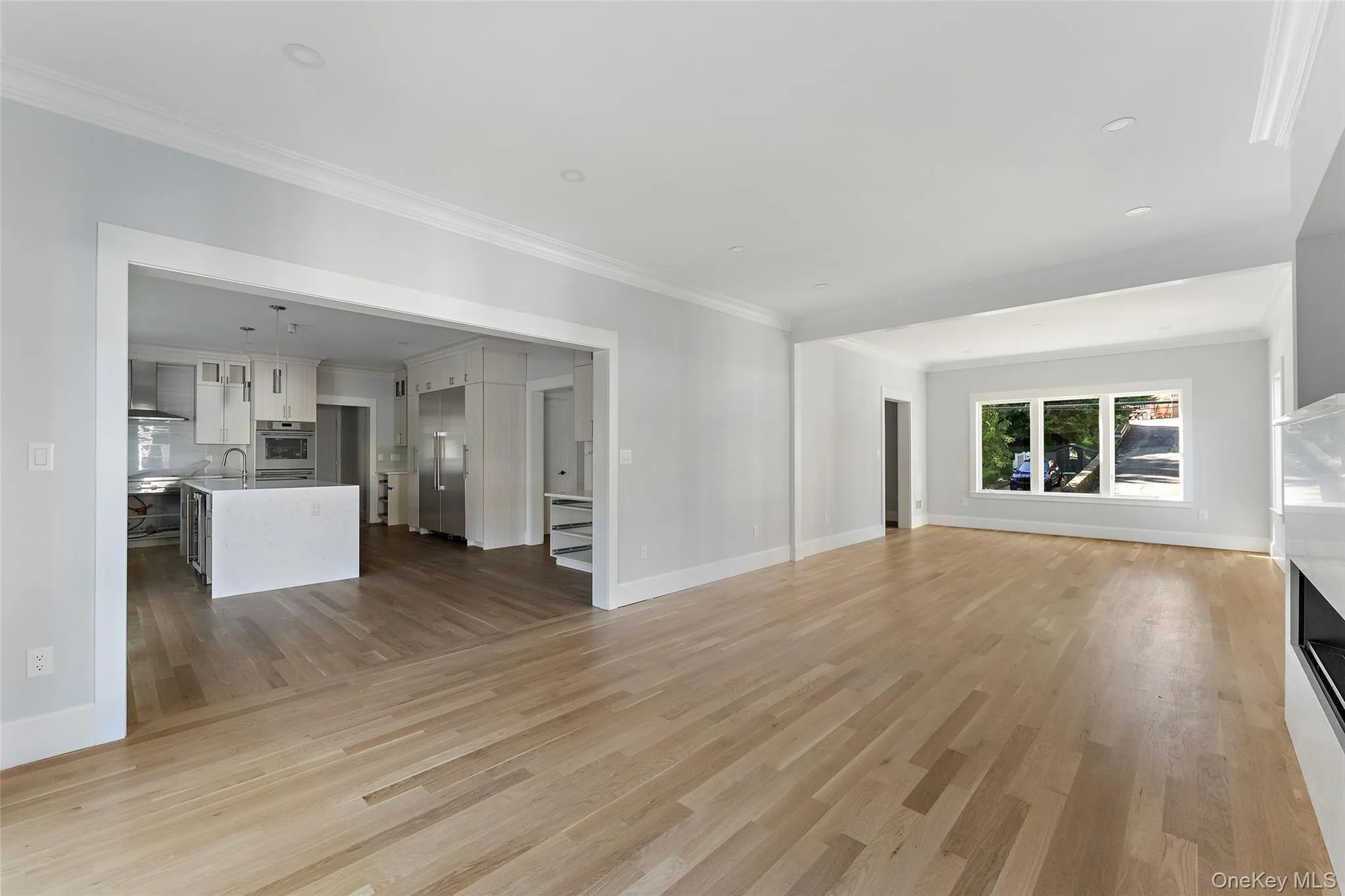Great room (Den and Living Room) off of kitchen. Great room (Den and Living Room) off of kitchen.