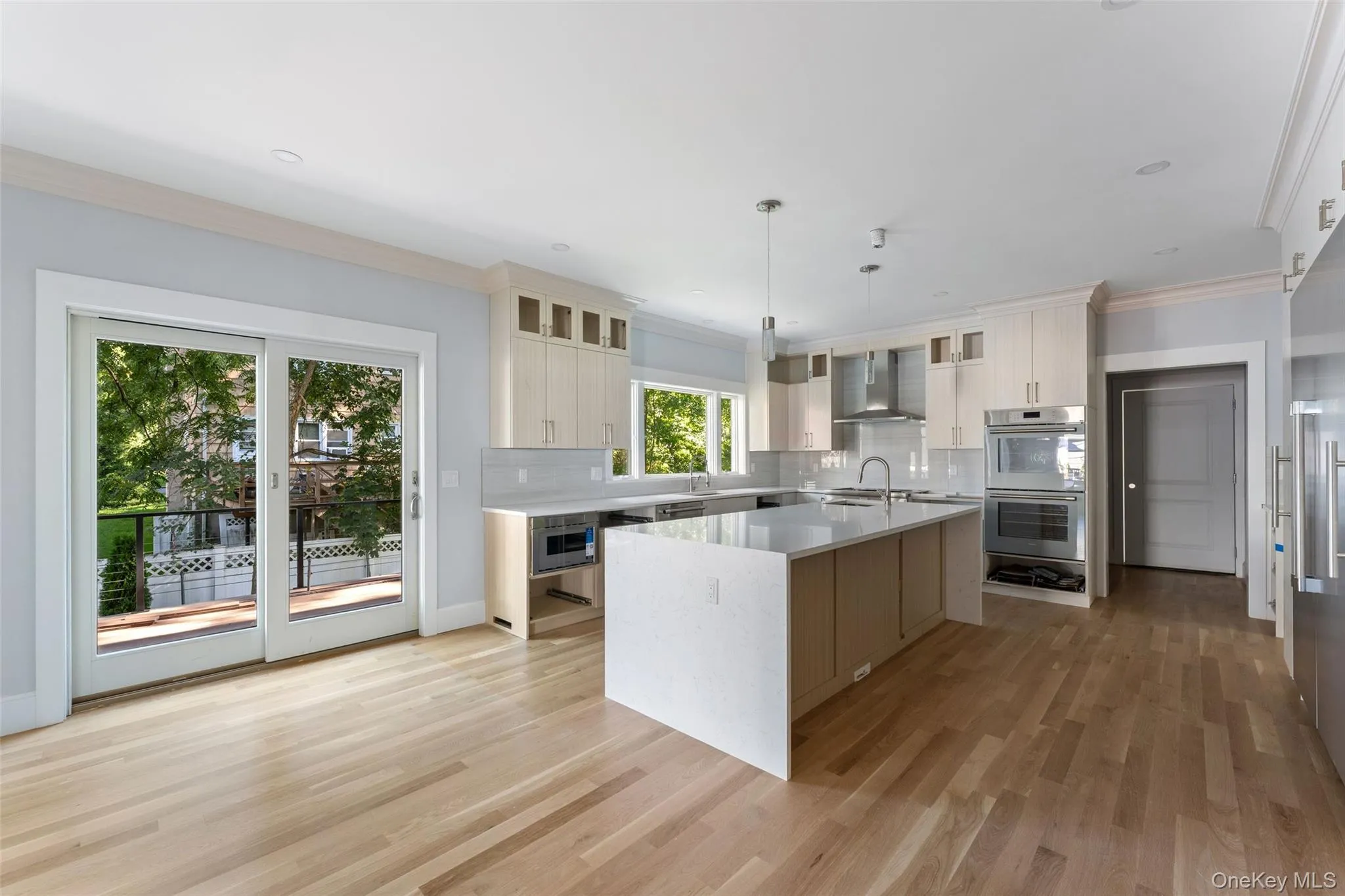 Generously sized kitchen with island, 2 sinks, Thermador appliances. Cabinetry almost complete - waiting on final pieces. Generously sized kitchen with island, 2 sinks, Thermador appliances. Cabinetry almost complete - waiting on final pieces.