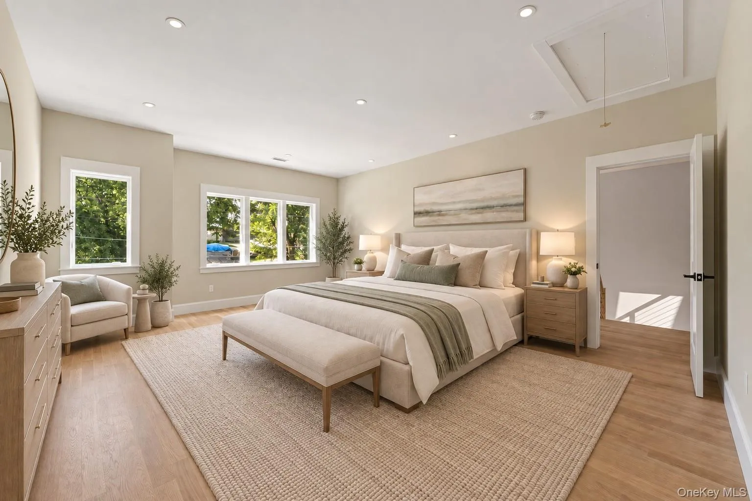 Virtually staged primary bedroom with ensuite oversized bathroom and two generously sized walk in closets. Virtually staged primary bedroom with ensuite oversized bathroom and two generously sized walk in closets.