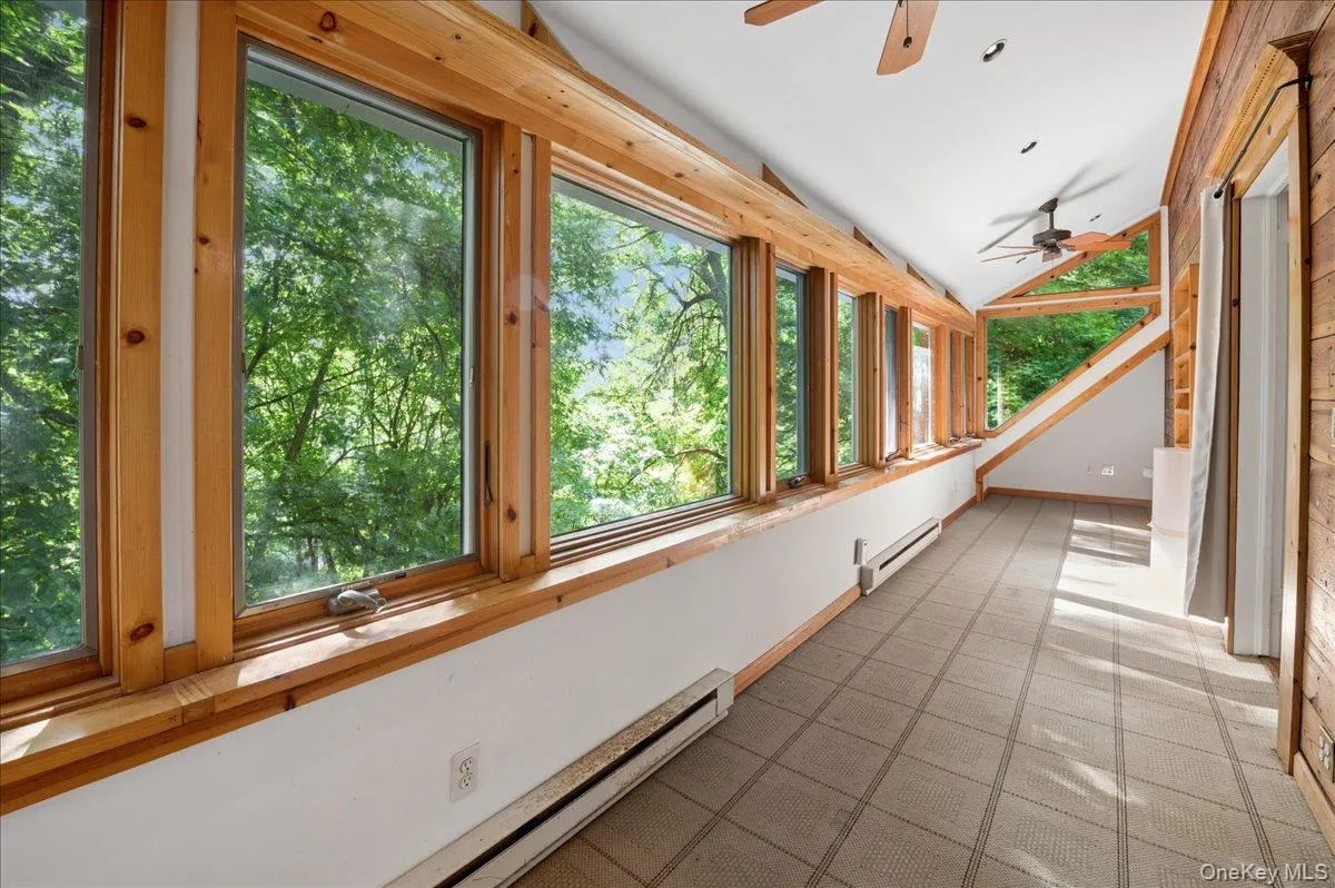 Main floor enclosed four season porch Southeast view Main floor enclosed four season porch Southeast view
