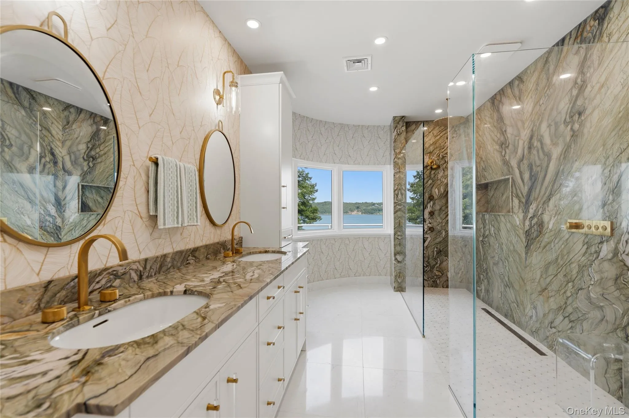 Primary designer marble bath with dual vanities Primary designer marble bath with dual vanities