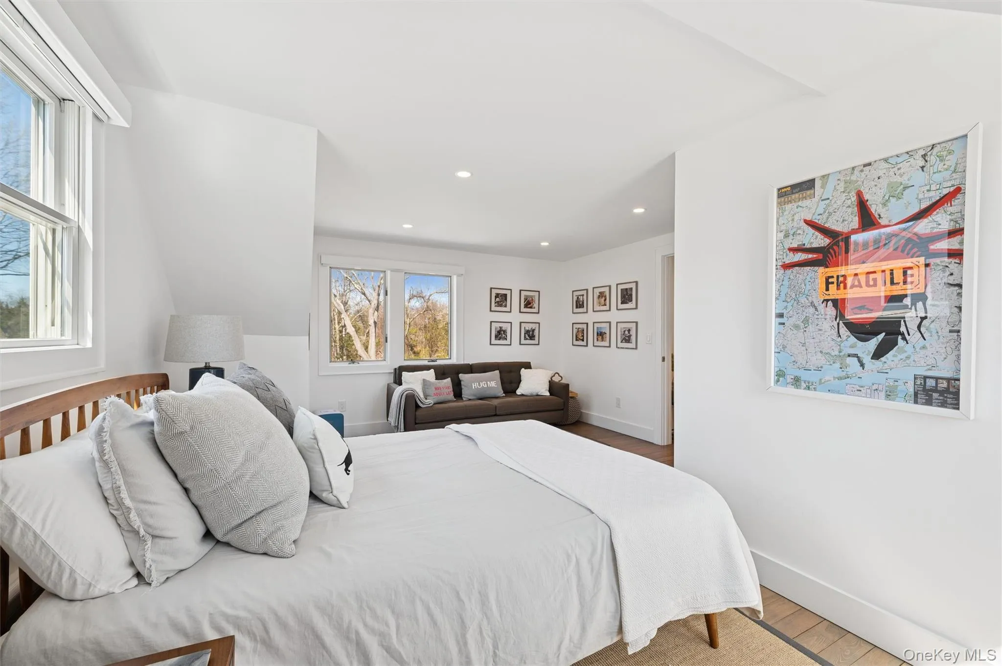 Bedroom with recessed lighting, baseboards, and wood finished floors Bedroom with recessed lighting, baseboards, and wood finished floors