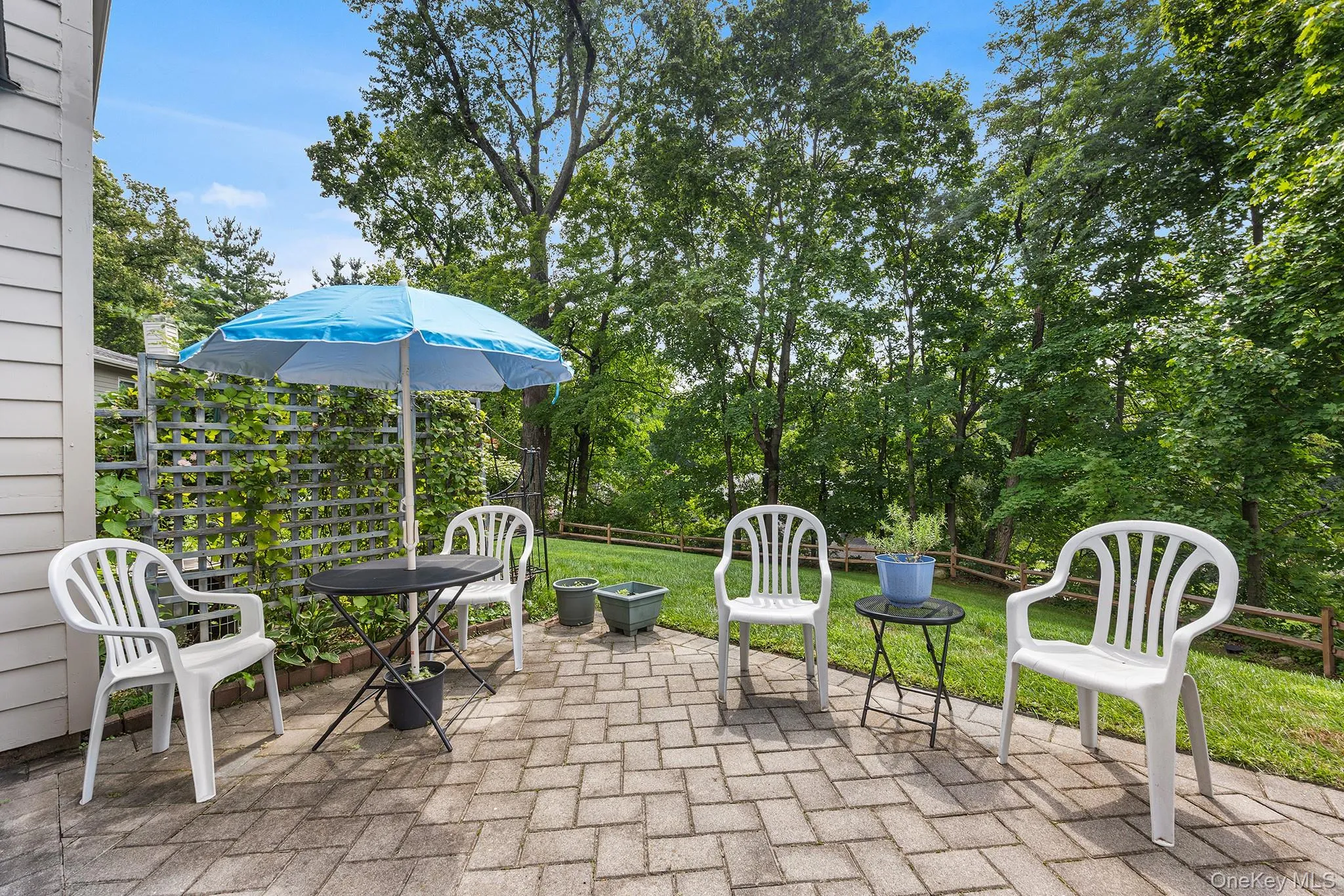Private patio with stone-pavers. Private patio with stone-pavers.