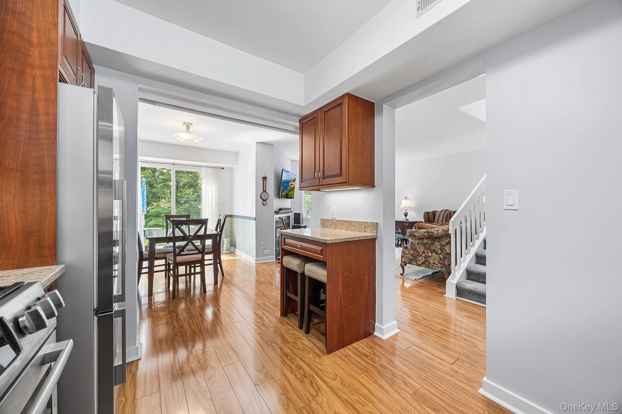 Another kitchen view with breakfast bar section. Another kitchen view with breakfast bar section.