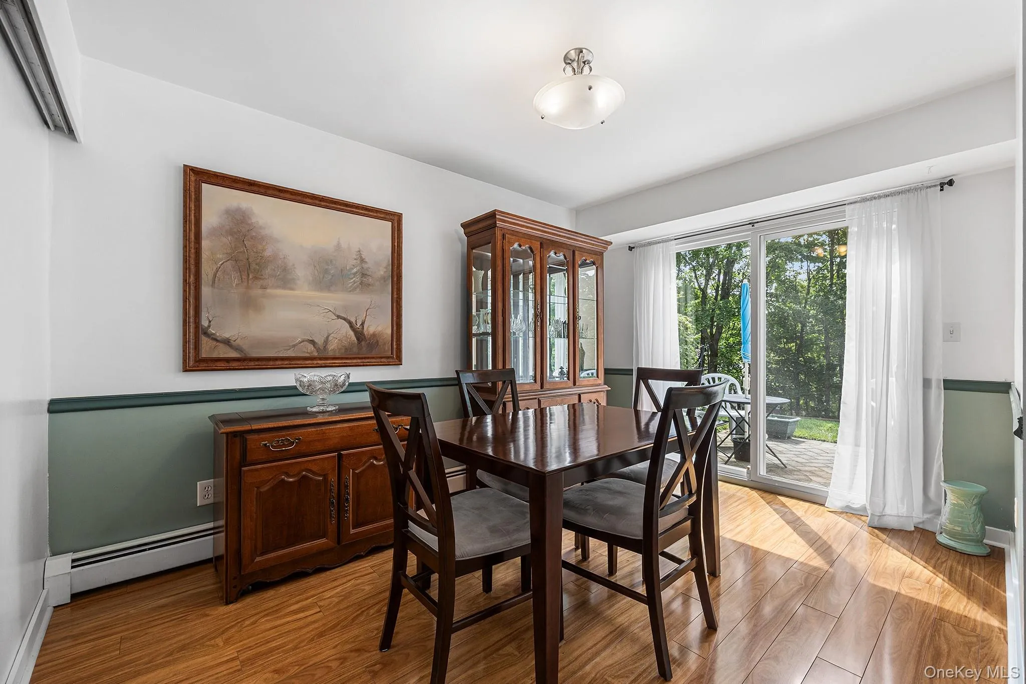 Dining area and patio access. Dining area and patio access.