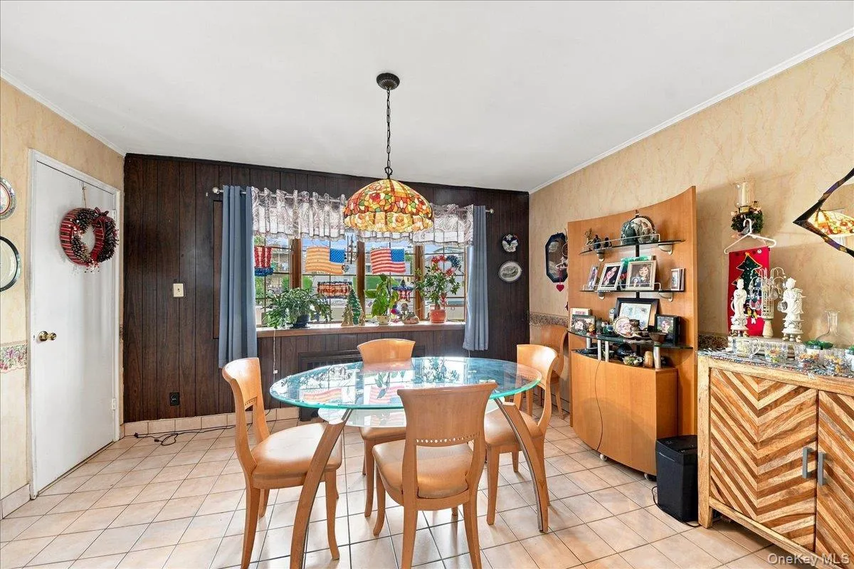 Bright open dining room with access to basement Bright open dining room with access to basement