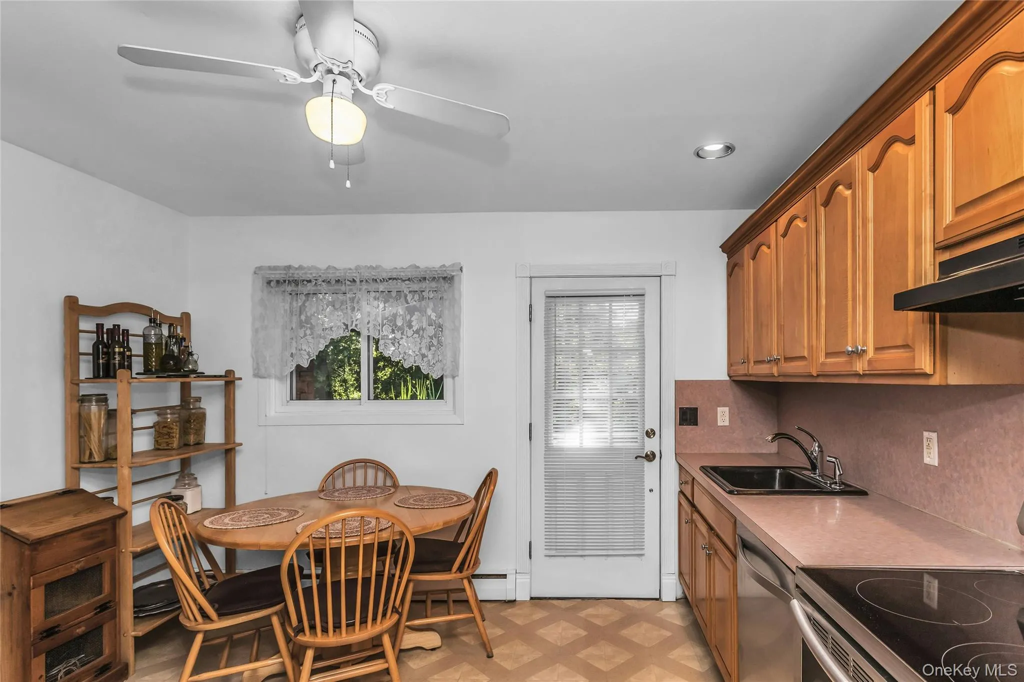 Kitchen With Door Leading To Wood Deck Kitchen With Door Leading To Wood Deck