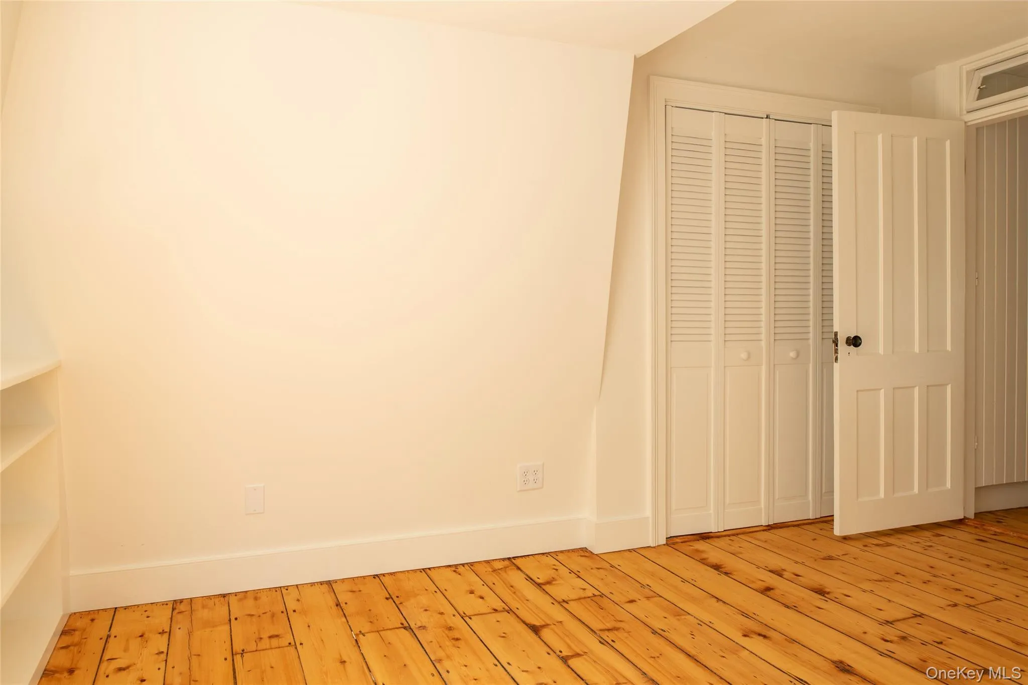 2nd bedroom on right side of hallway past walkup attic door. 2nd bedroom on right side of hallway past walkup attic door.