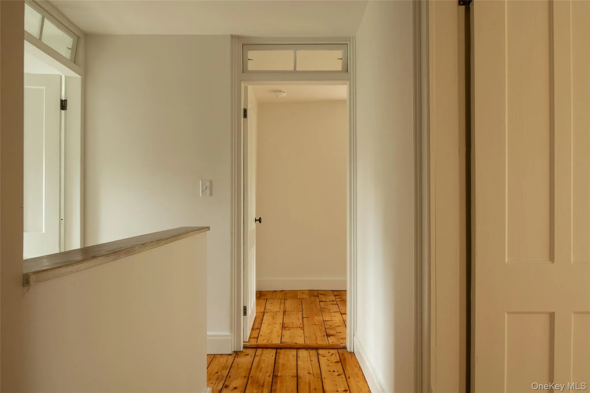 Upstairs hallway. Door ahead in photos is the laundry room at the top of the stairs. Upstairs hallway. Door ahead in photos is the laundry room at the top of the stairs.