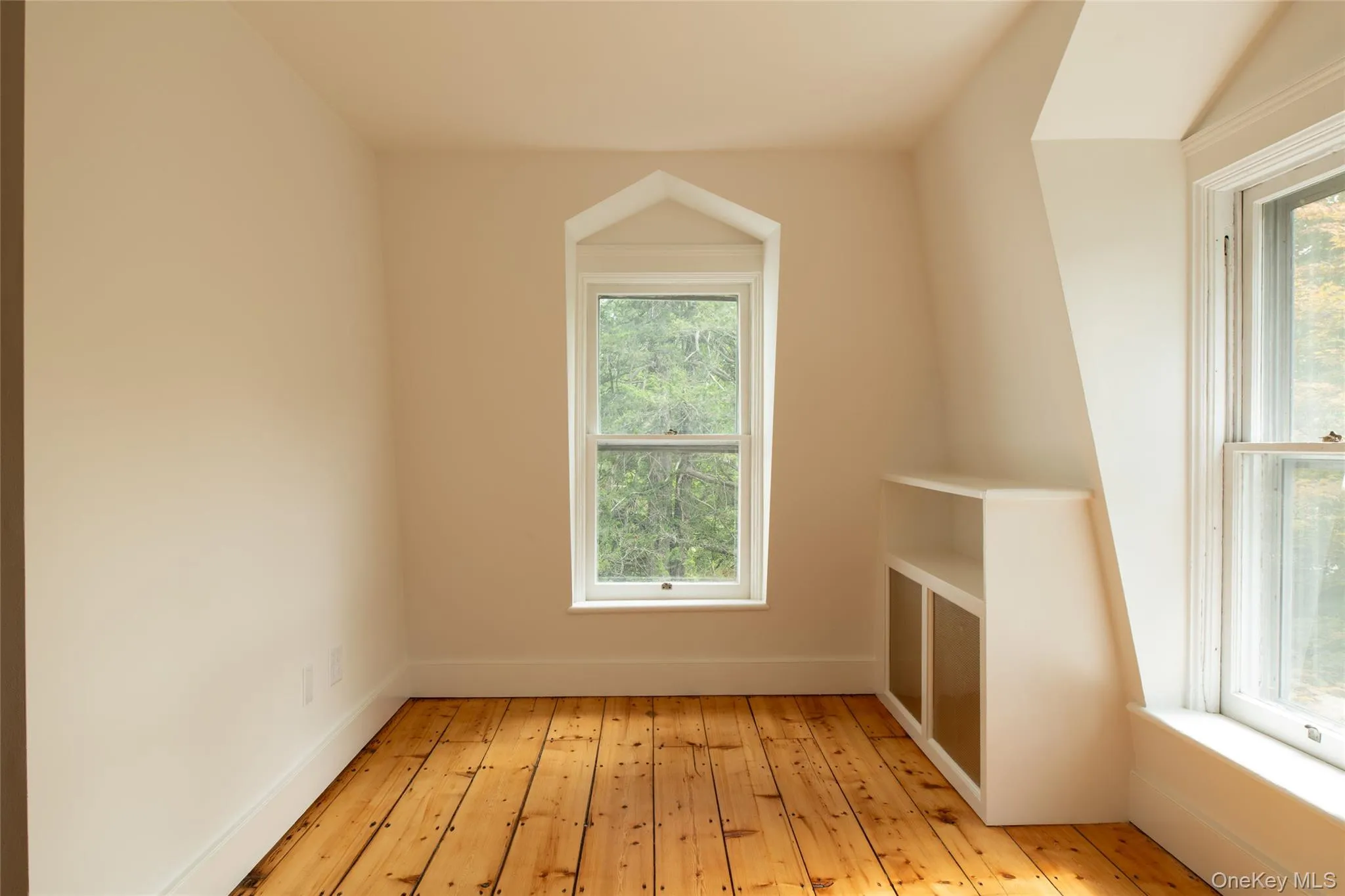2nd bedroom on right side of hallway past walkup attic door. 2nd bedroom on right side of hallway past walkup attic door.