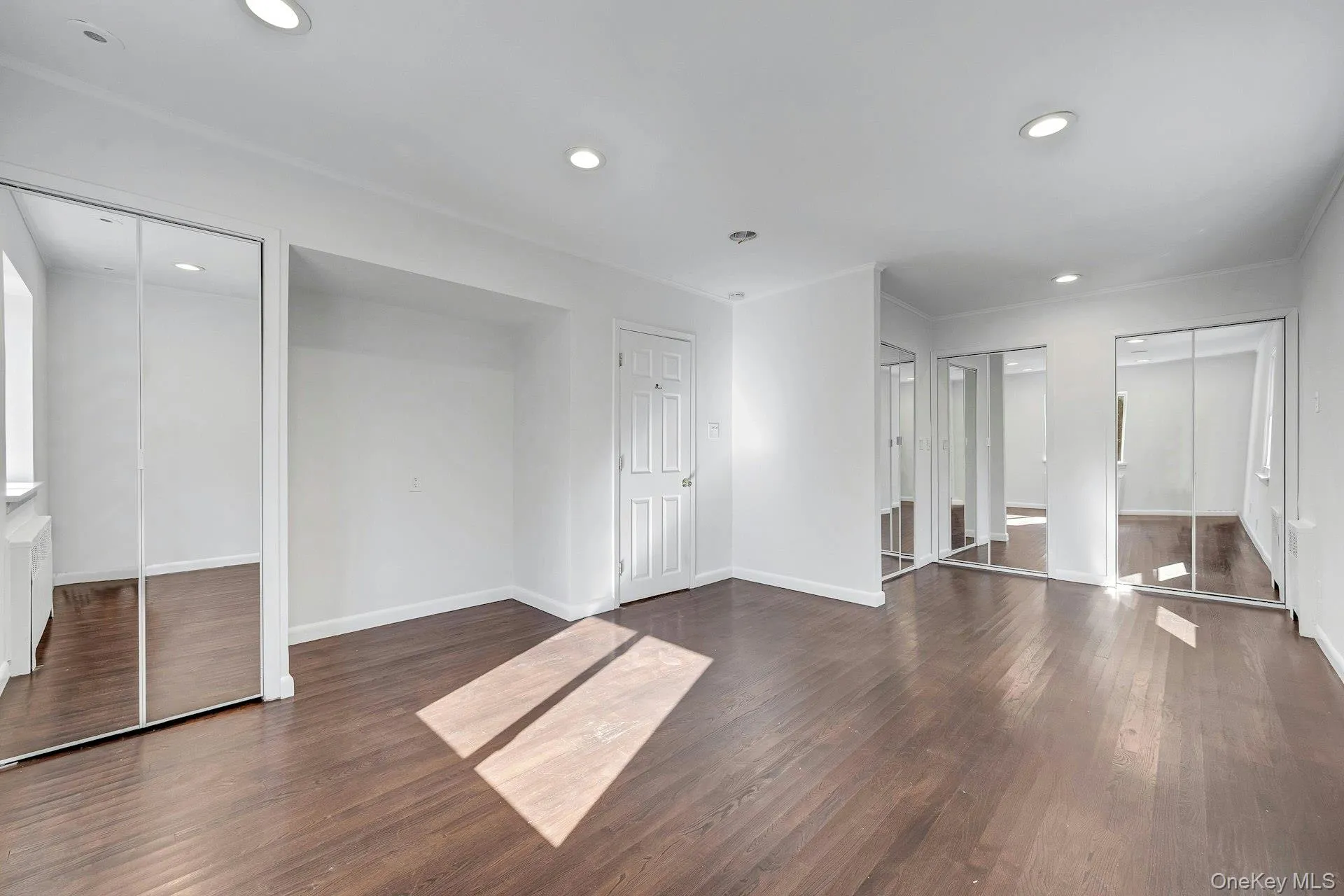 Primary bedroom on 1st floor with 4 closets Primary bedroom on 1st floor with 4 closets