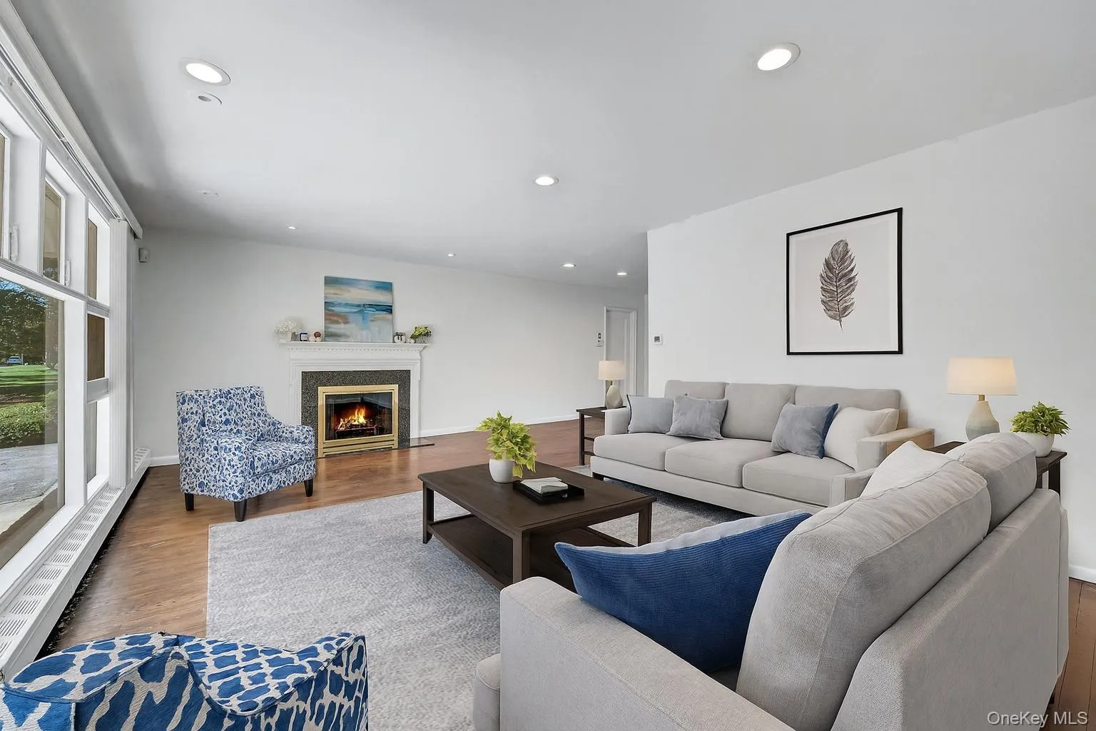 Fireplace adds warmth to living room - Virtually staged Fireplace adds warmth to living room - Virtually staged