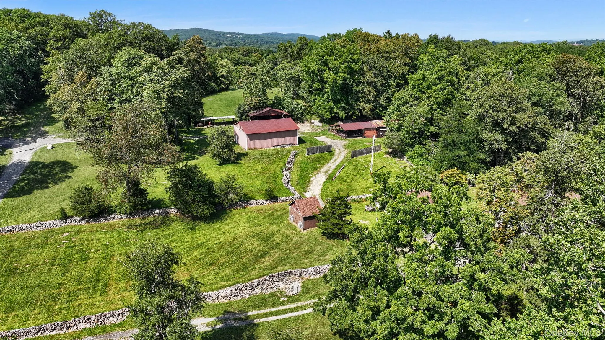 View of property location featuring a heavily wooded area View of property location featuring a heavily wooded area