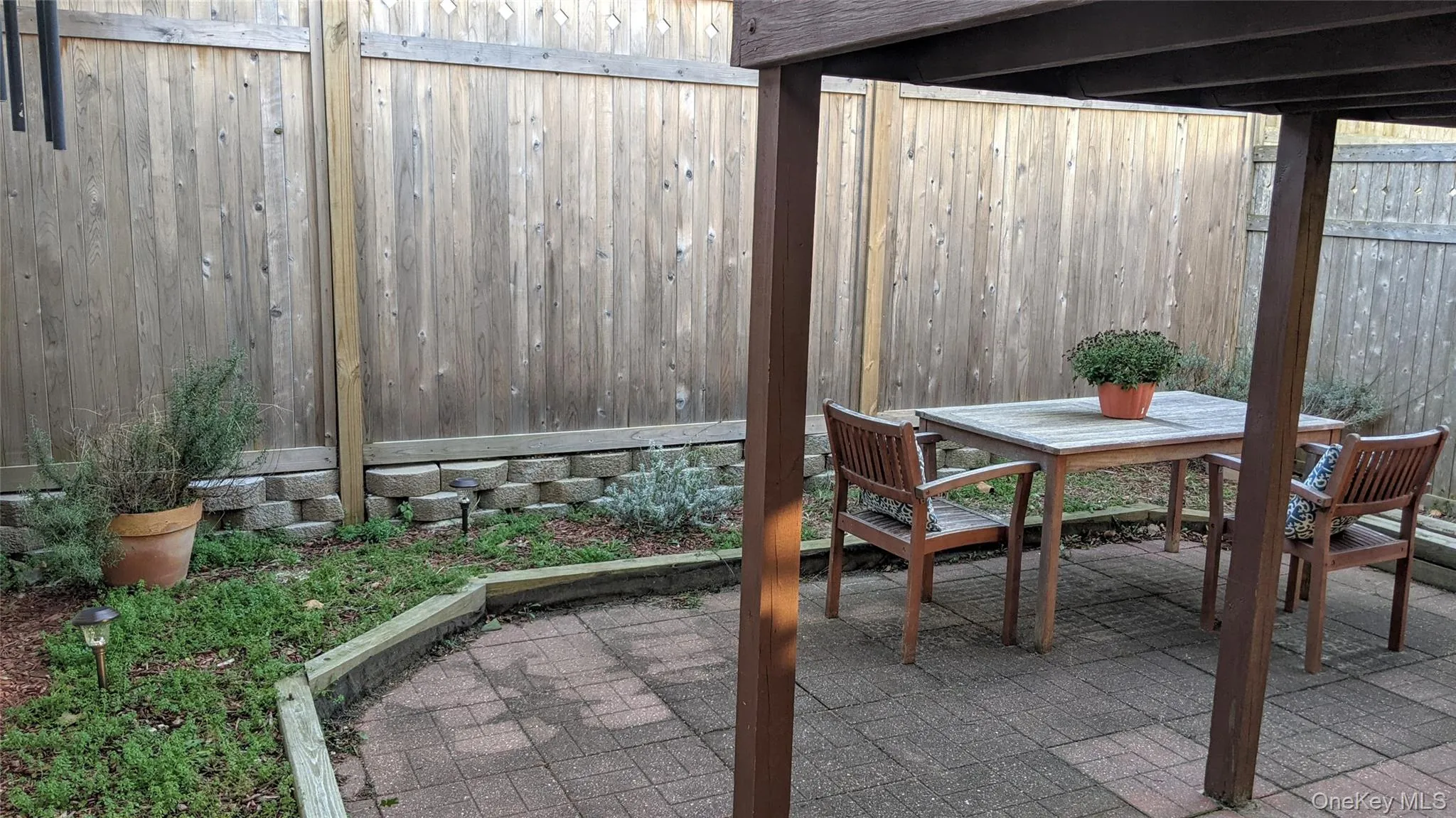 Semi-private backyard (deck above used by 1st floor residents) Semi-private backyard (deck above used by 1st floor residents)