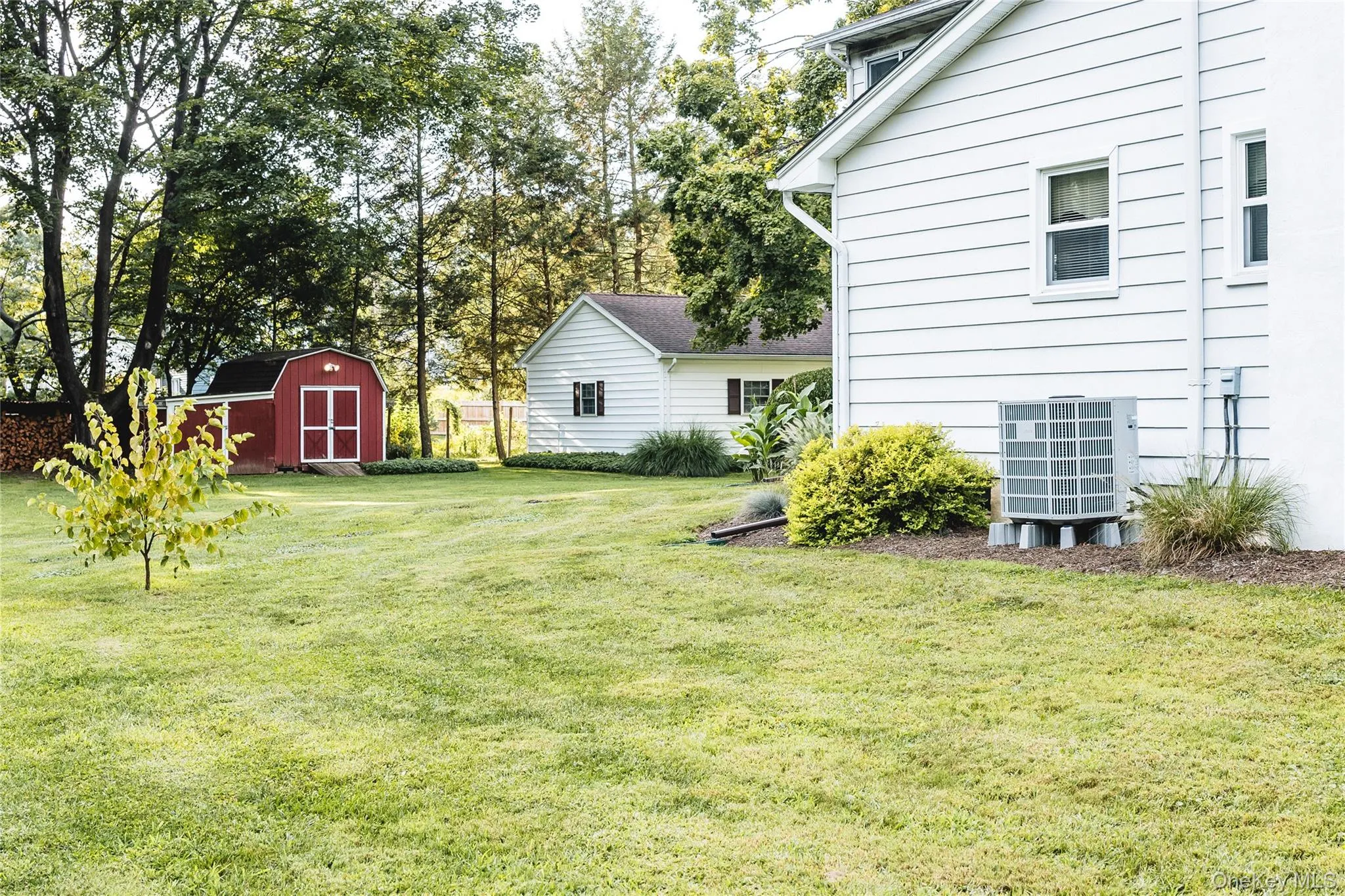 Features a large shed for additional storage Features a large shed for additional storage