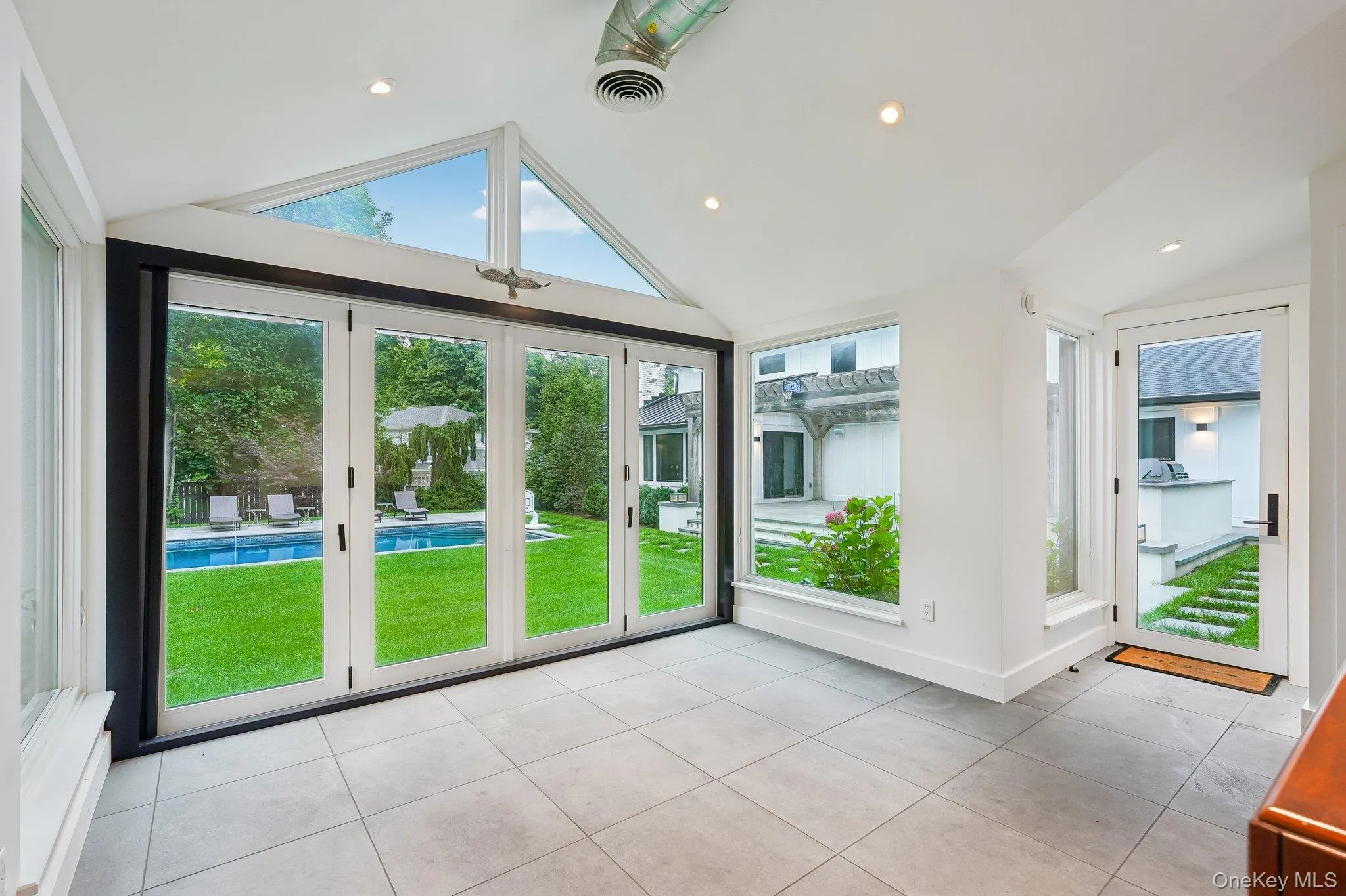 Pool/guest house with bifold doors. Pool/guest house with bifold doors.