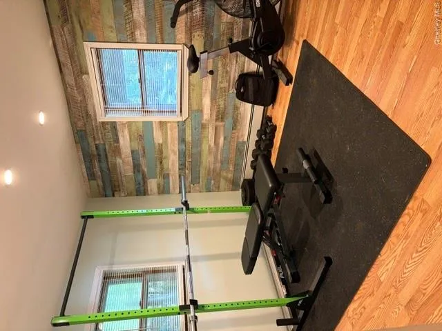 1st floor bedroom with 2 windows for natural and great air circulation.. Currently being used as a gym 1st floor bedroom with 2 windows for natural and great air circulation.. Currently being used as a gym