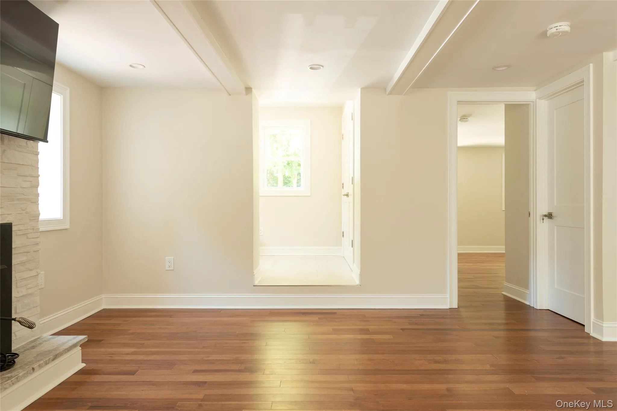 living room, access to bedroom on right living room, access to bedroom on right