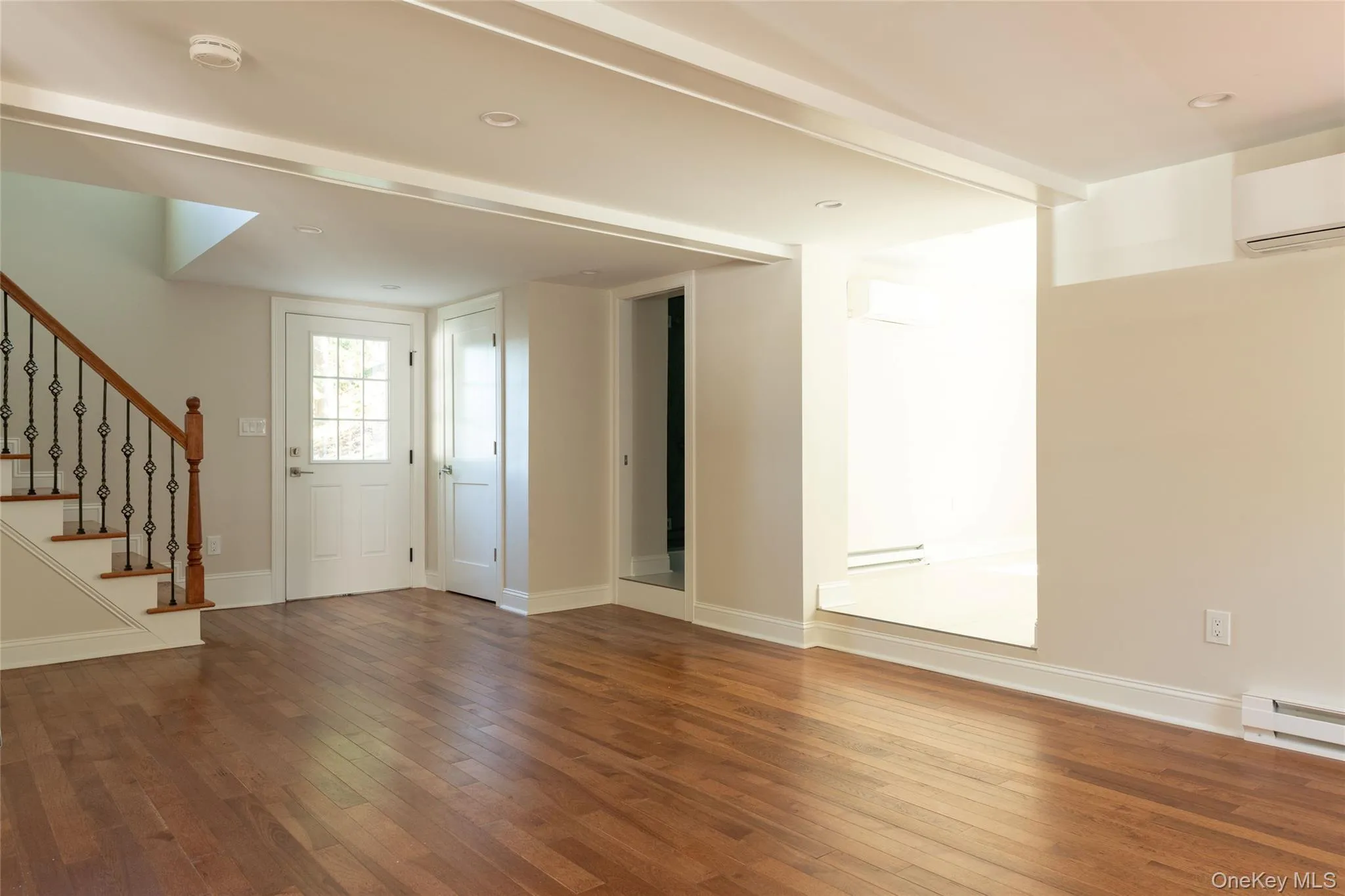 living room w/ kitchen on right and then 1st floor full bath living room w/ kitchen on right and then 1st floor full bath