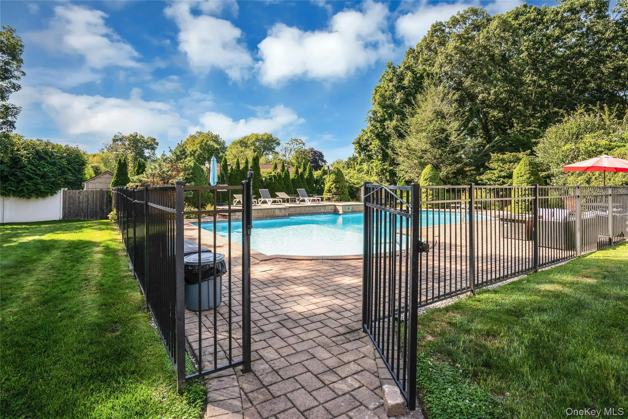 Pool has is surrounded by executive fencing. Pool has is surrounded by executive fencing.